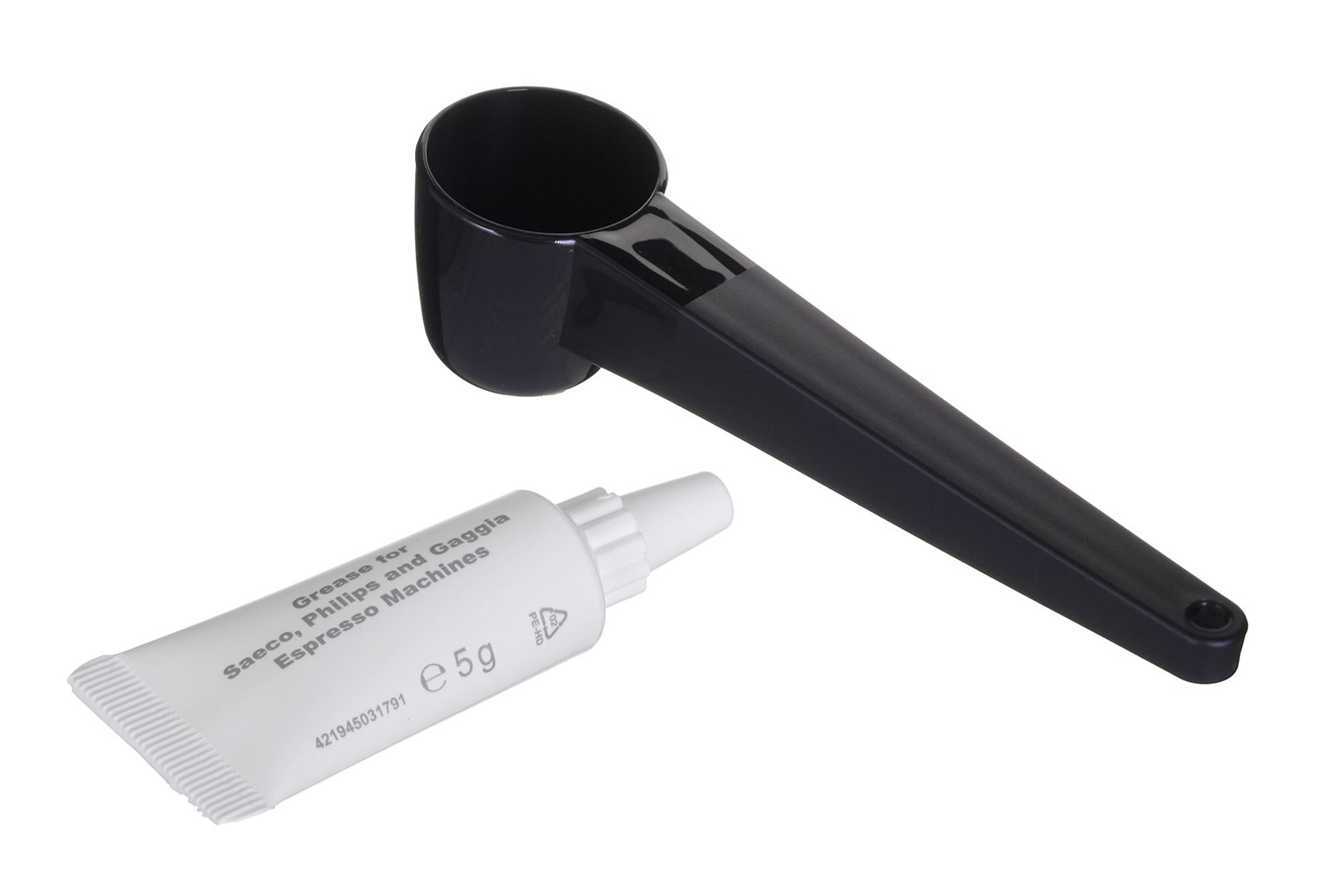 Czarna miarka i biała tubka smaru do ekspresów do kawy na białym tle. Na tubce napis 'Smar do Saeco...'