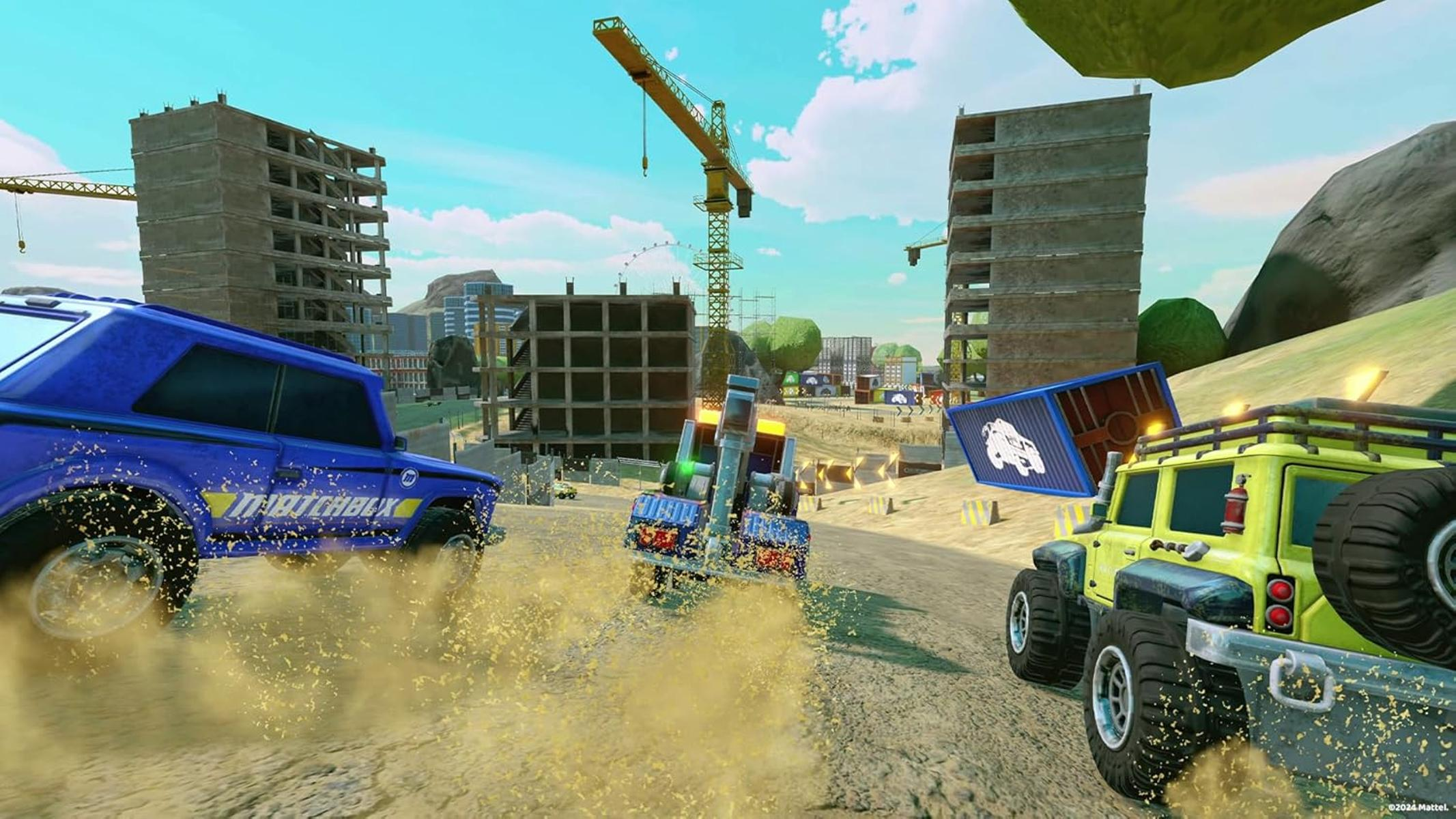Ein blauer Matchbox-Truck und ein gelber SUV rasen auf einer Dirt-Strecke. Kräne und unfertige Gebäude füllen den Hintergrund.