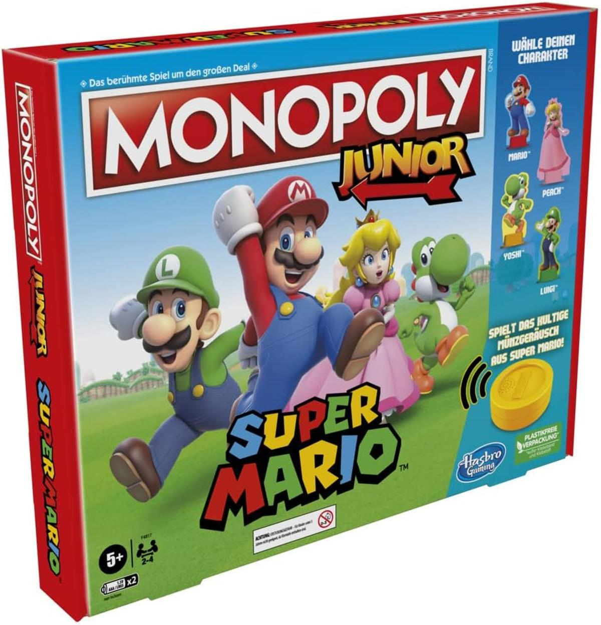Scatola Monopoly Junior Super Mario. Mario, Luigi, Peach e Yoshi sono presenti. La scatola del gioco ha il logo Hasbro Gaming.