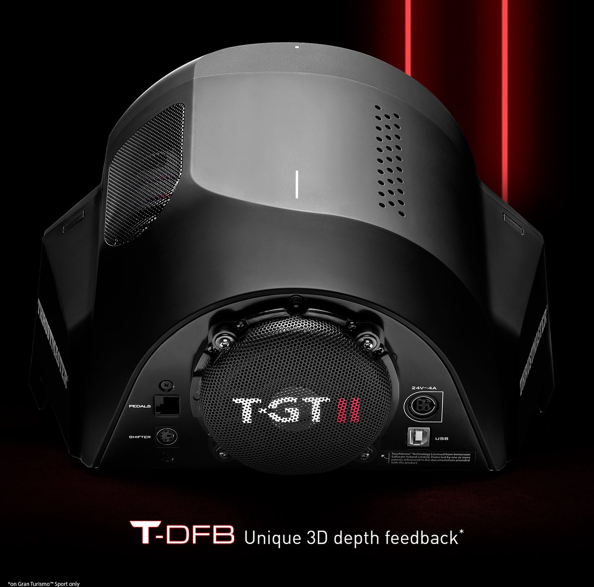 Ein schwarzer Rennradsockel mit dem Text "T-GT II" und verschiedenen Anschlüssen. Rote vertikale Linien sind im Hintergrund.