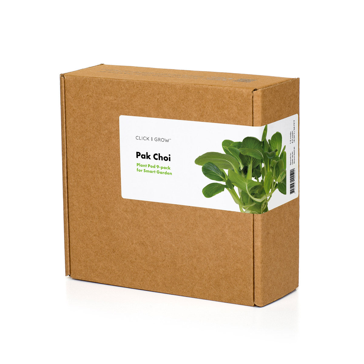 Une boîte en carton marron étiquetée 'Pak Choi' avec une image de plantes vertes. La boîte est pour un jardin intelligent.