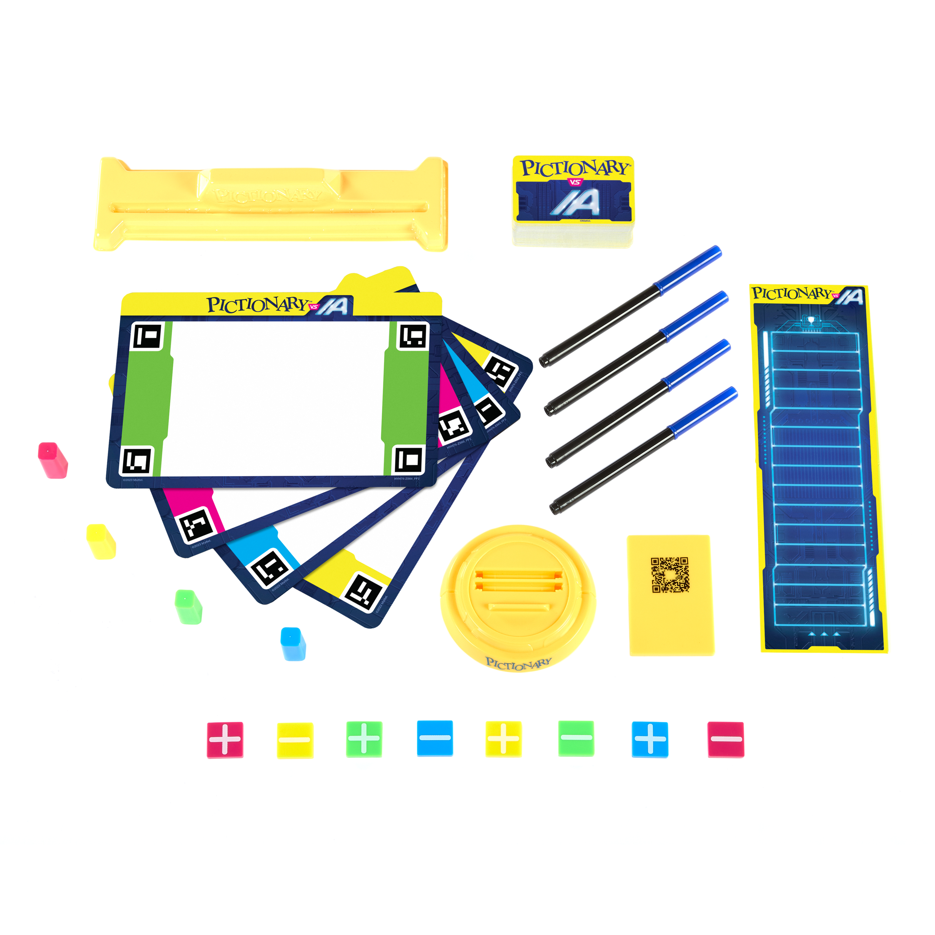 Zestaw gier Pictionary z kartami, długopisami i innymi elementami na białej powierzchni. Zawiera znaki plus i minus.