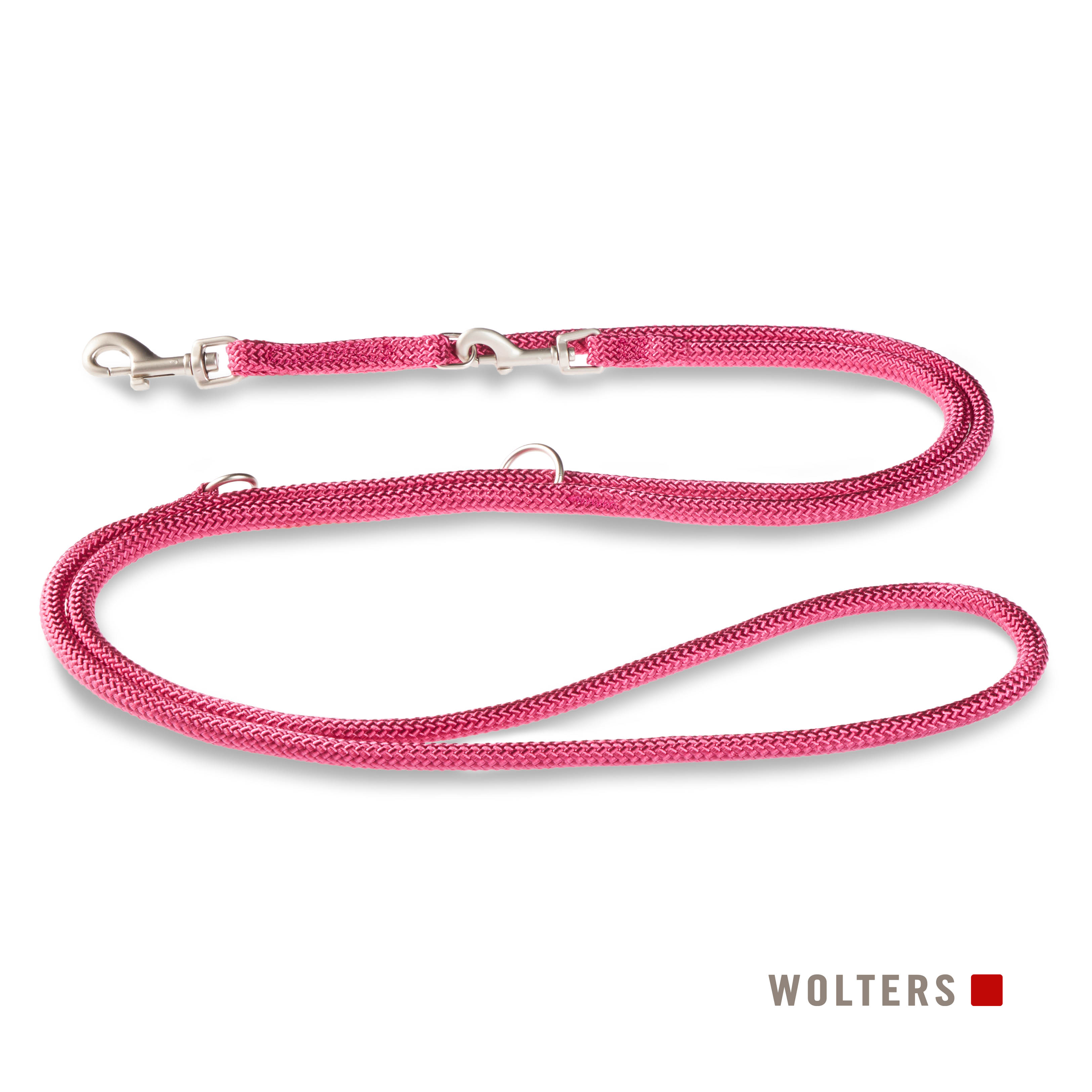 Eine rosa Hundeleine mit silbernen Verschlüssen und einem Ring, die auf einer weißen Oberfläche liegt. Der Markenname 'WOLTERS' steht unten.