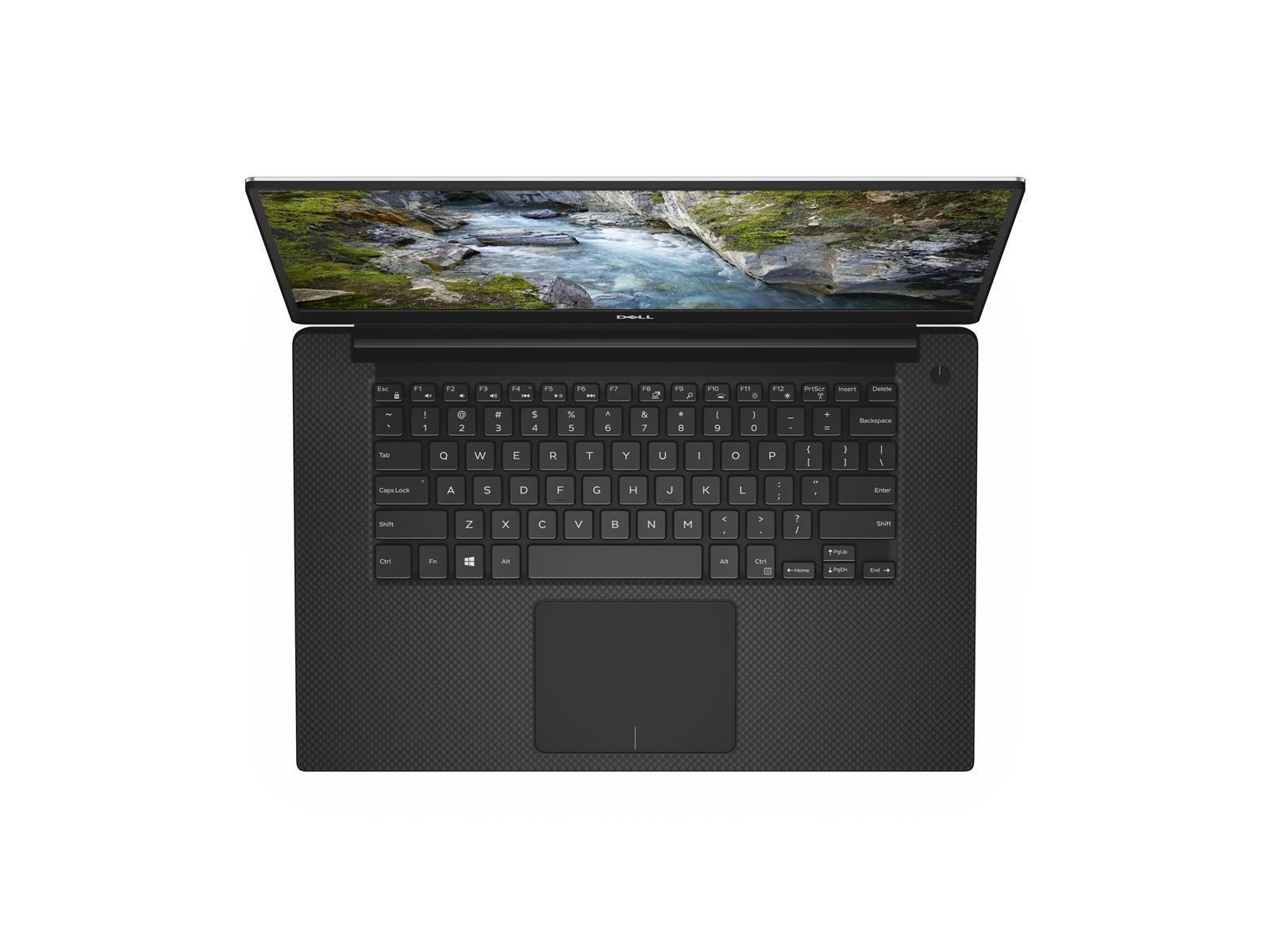 Ein Dell-Laptop ist geöffnet. Der Bildschirm zeigt eine Flussszene. Die Tastatur ist schwarz, mit einem Touchpad.