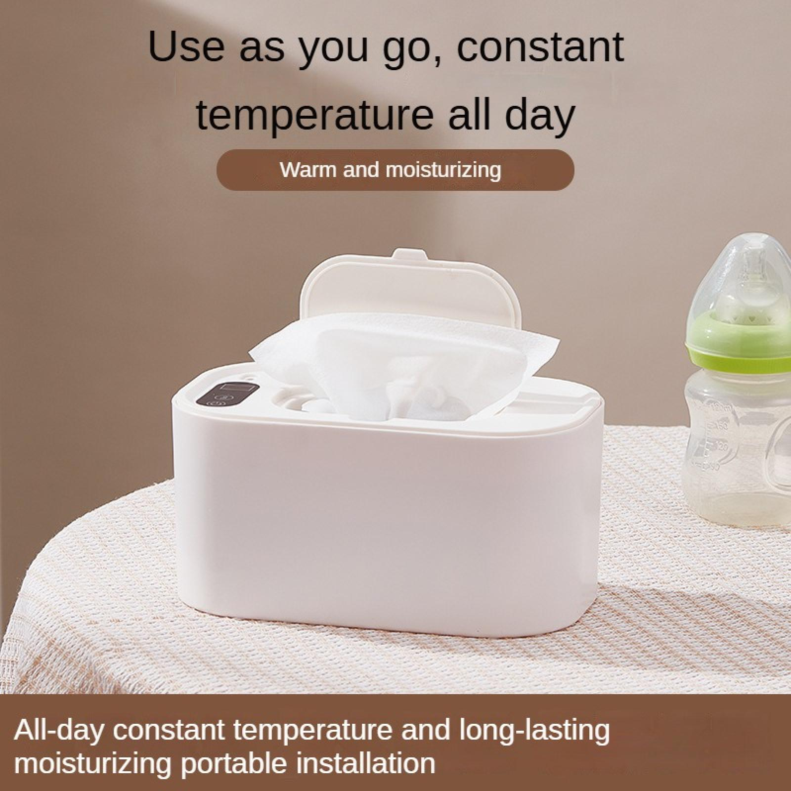 Weißer Wischtuchwärmer mit Tüchern, Babyflasche rechts. Text oben: 'Benutze es, konstante Temperatur'.