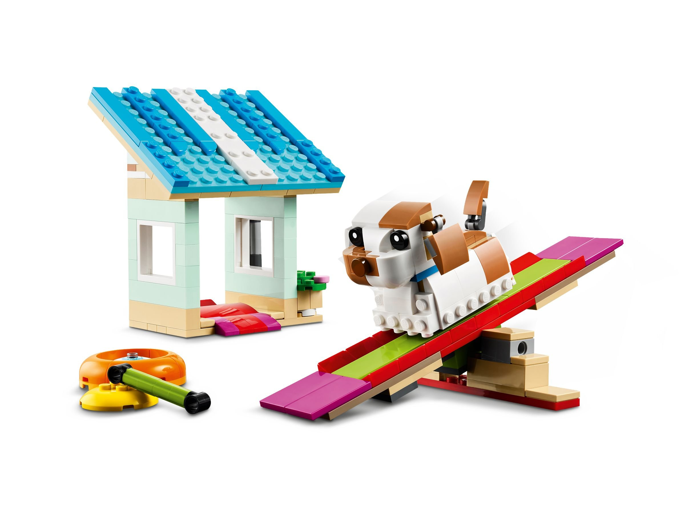 Un set Lego raffigura un cane su una bilancia, una cuccia e un giocattolo. Il cane è bianco e marrone.