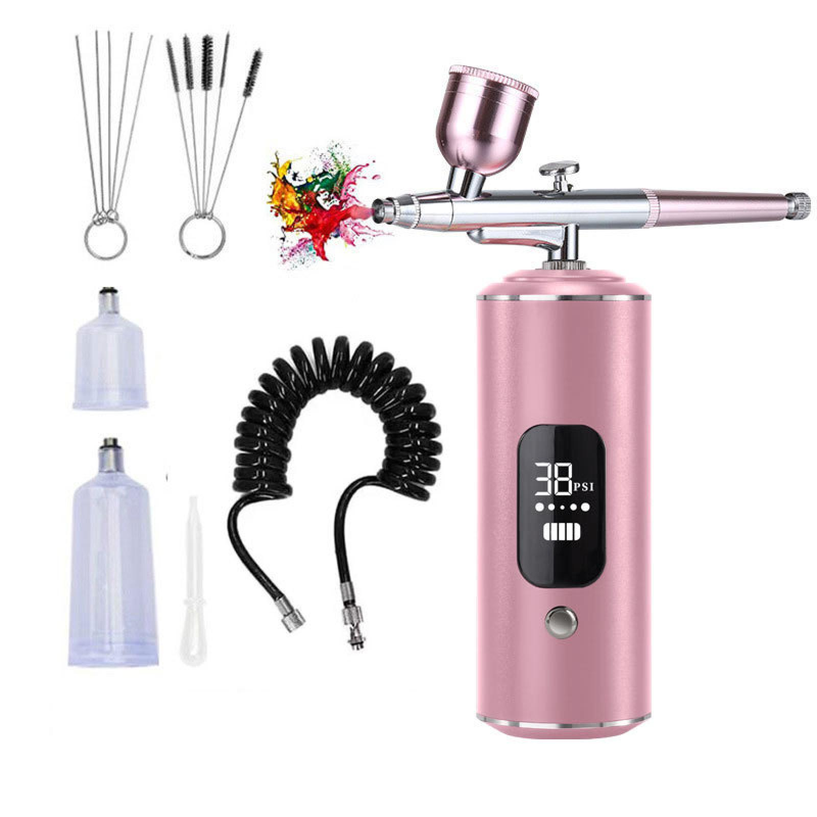 Rosa Airbrush-Set mit Zubehör. Enthält Airbrush, Schlauch, Reinigungswerkzeuge und Flaschen. Anzeige zeigt 38 PSI.