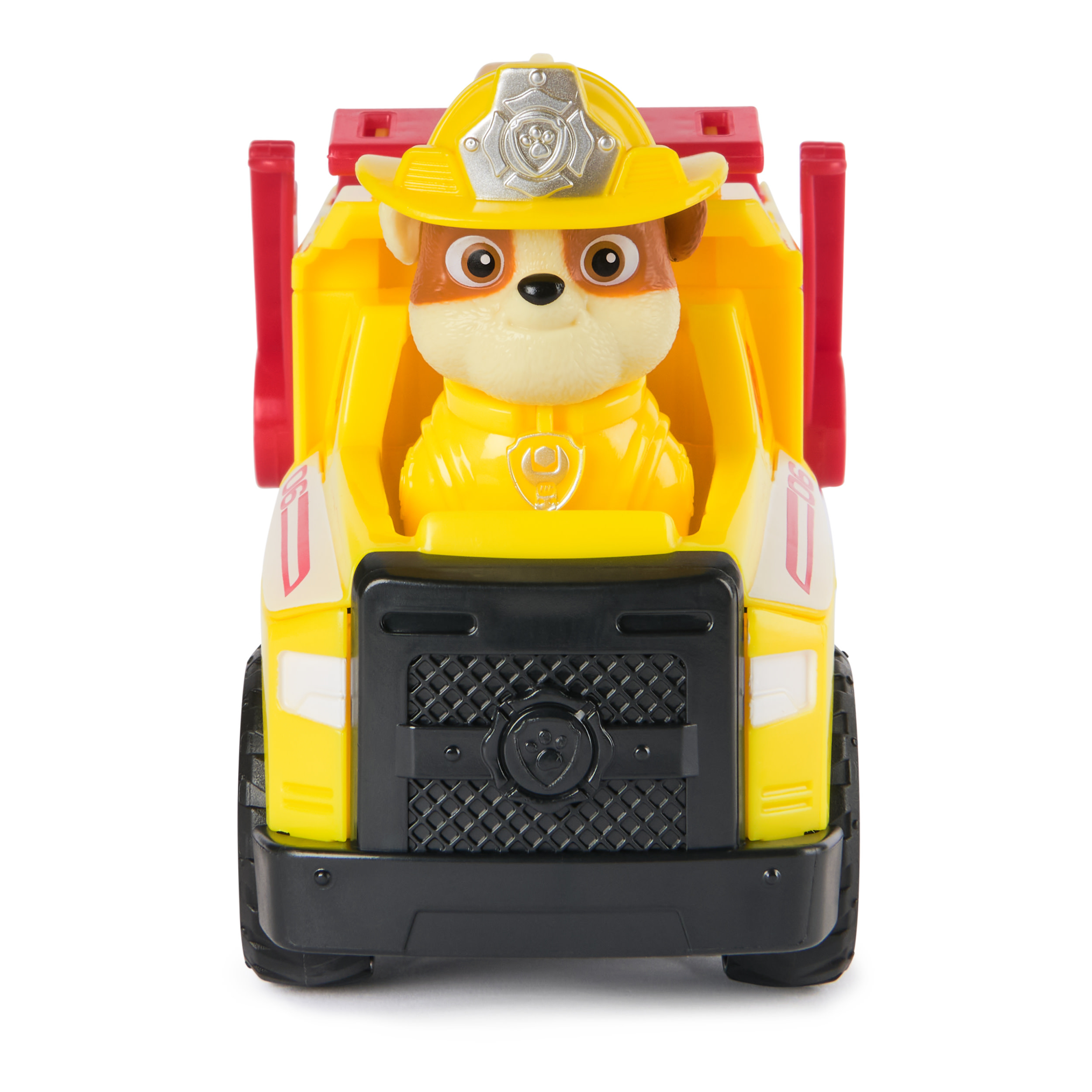 Un camion de pompiers jouet jaune avec un chien conducteur portant un casque jaune. Le camion a une calandre noire et des détails rouges.