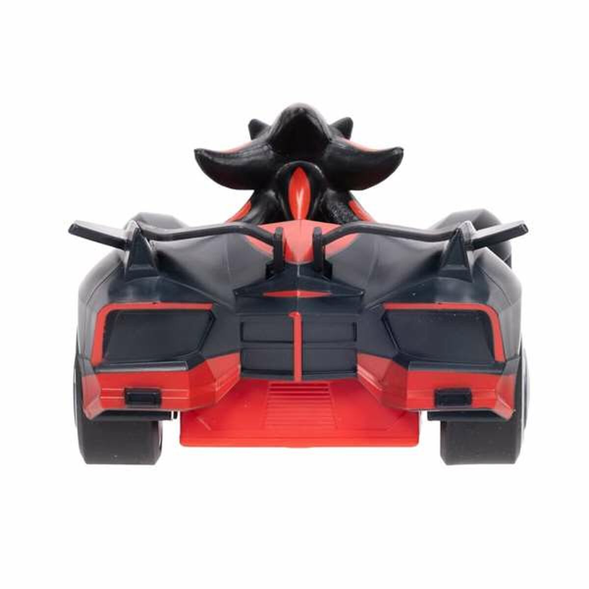 Vista trasera de un coche de juguete. Colores negro y rojo. El coche tiene un diseño único y el fondo es blanco.