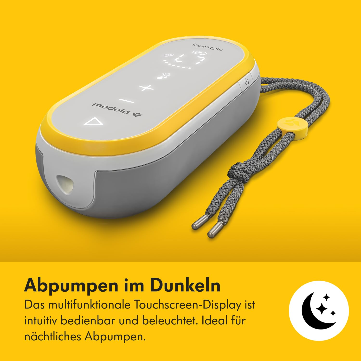 Eine Medela Freestyle Brustpumpe, grau und gelb, mit einem Umhängeband, auf gelbem Hintergrund. Text unten.