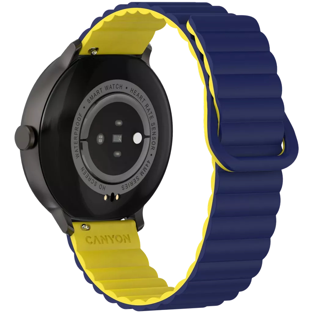 Czarny smartwatch z niebiesko-żółtym paskiem. Zegarek pokazuje tył, z tekstem i czujnikami. Pasek jest magnetyczny.
