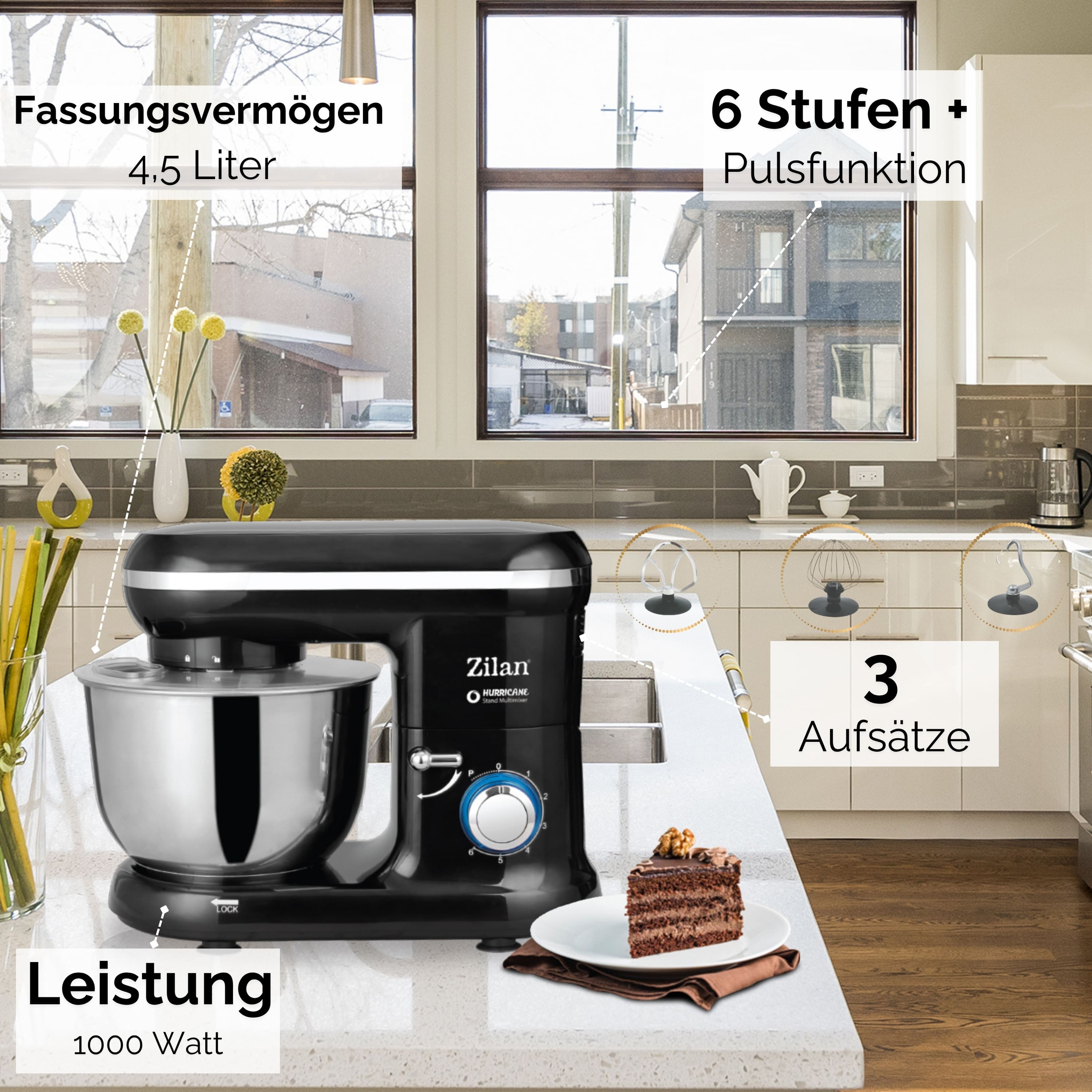 Ein schwarzer Zilan-Küchenmixer steht auf einer Theke. Ein Stück Kuchen ist im Vordergrund. Fenster und Küche sind im Hintergrund.