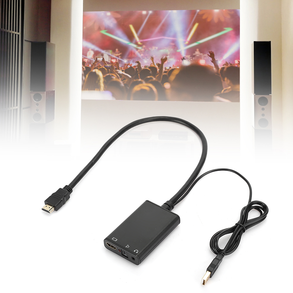 Schwarzer HDMI-Adapter mit angeschlossenen Kabeln. Im Hintergrund eine projizierte Konzernszene.