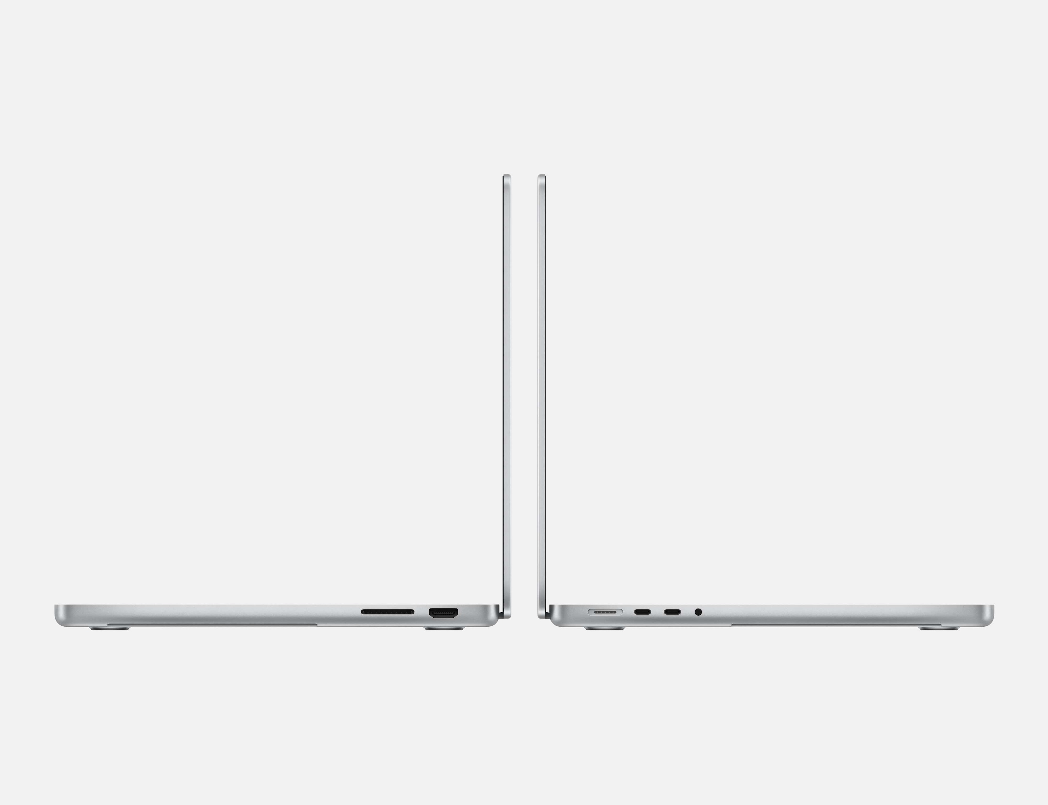 Twee zilveren laptops naast elkaar, die hun profielen laten zien. Eén open, de ander gesloten. Witte achtergrond.