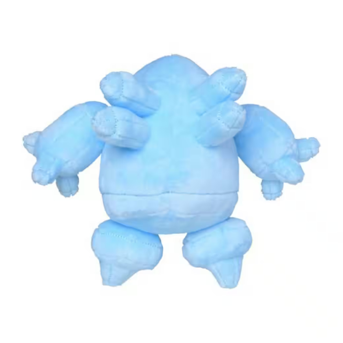 Ein hellblaues Plüschtier, das einer Comicfigur ähnelt, steht vor einem weißen Hintergrund. Es hat mehrere Anhänge.