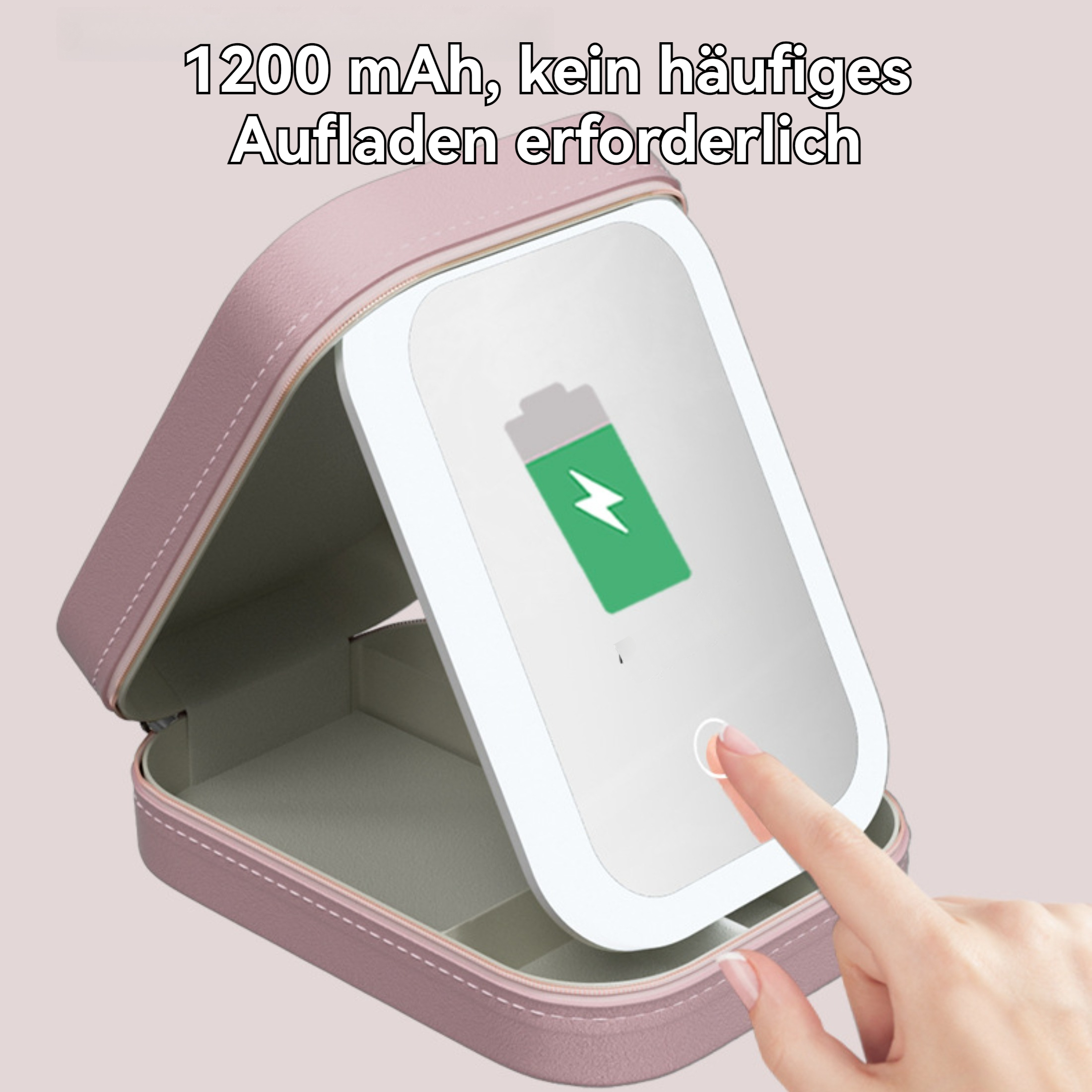 Ein rosa Make-up-Etui mit Spiegel. Ein Finger berührt den Ein-Aus-Knopf des Spiegels. Der Spiegel zeigt ein Batteriesymbol.
