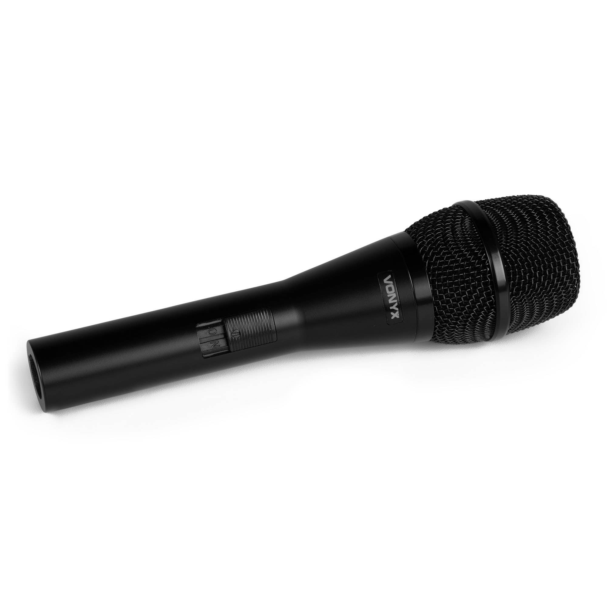 A black Vonyx microphone lies on a white surface. It has a mesh head, a handle with an on/off switch, and the Vonyx logo.