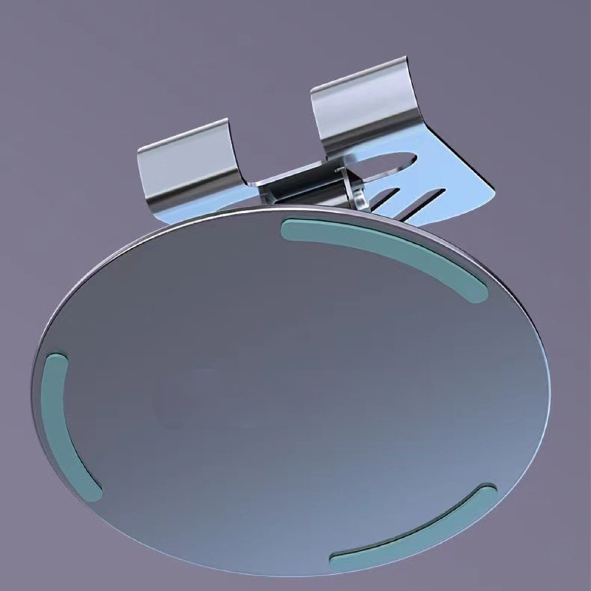 Błyszczący metalowy przedmiot, przypominający stojak, z owalną podstawą i dwoma zakrzywionymi górnymi elementami. Jasnozielone akcenty na podstawie.