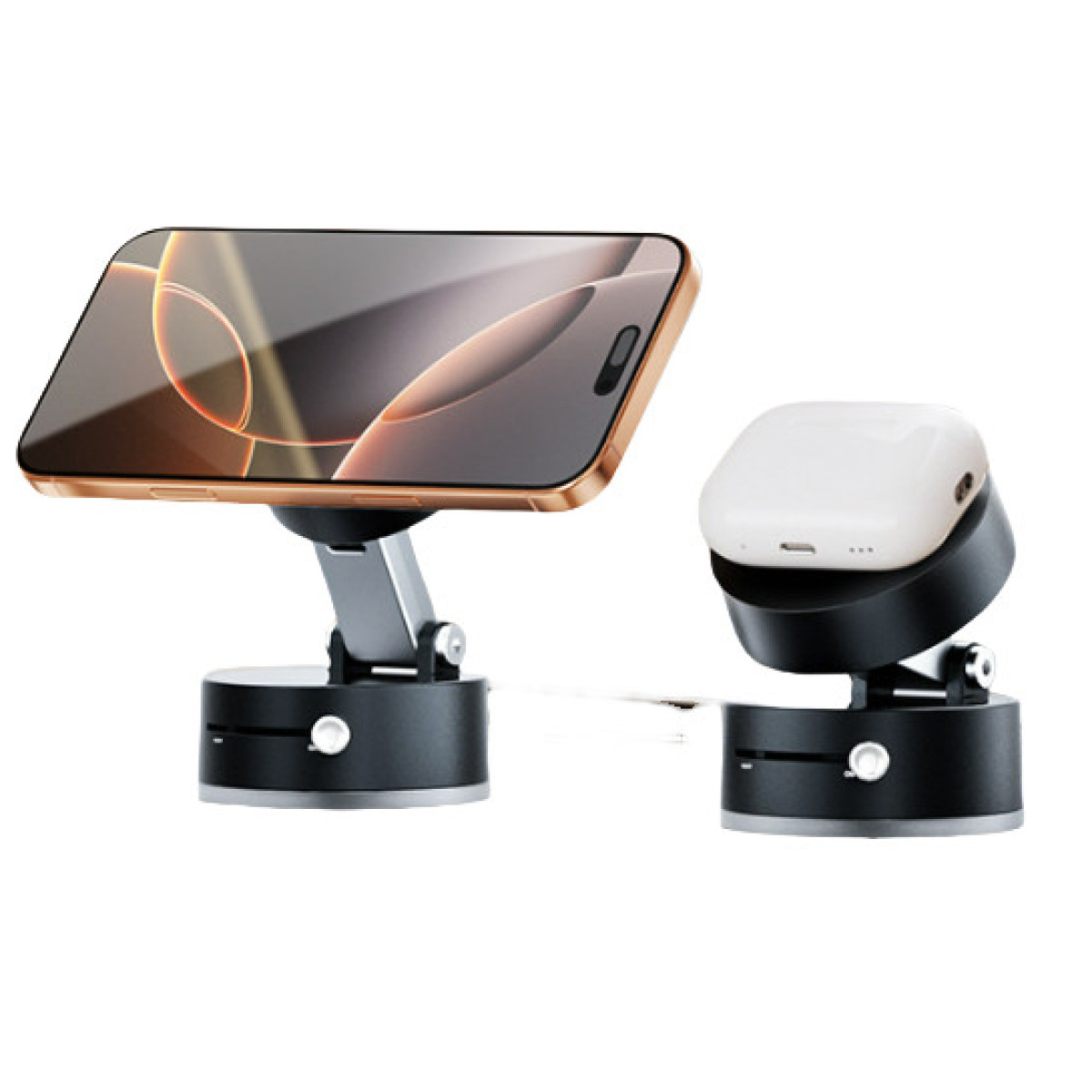 Złota ramka telefonu stoi na czarnym stojaku. Obok białe etui na słuchawki spoczywa na podobnym stojaku, oba na białym tle.