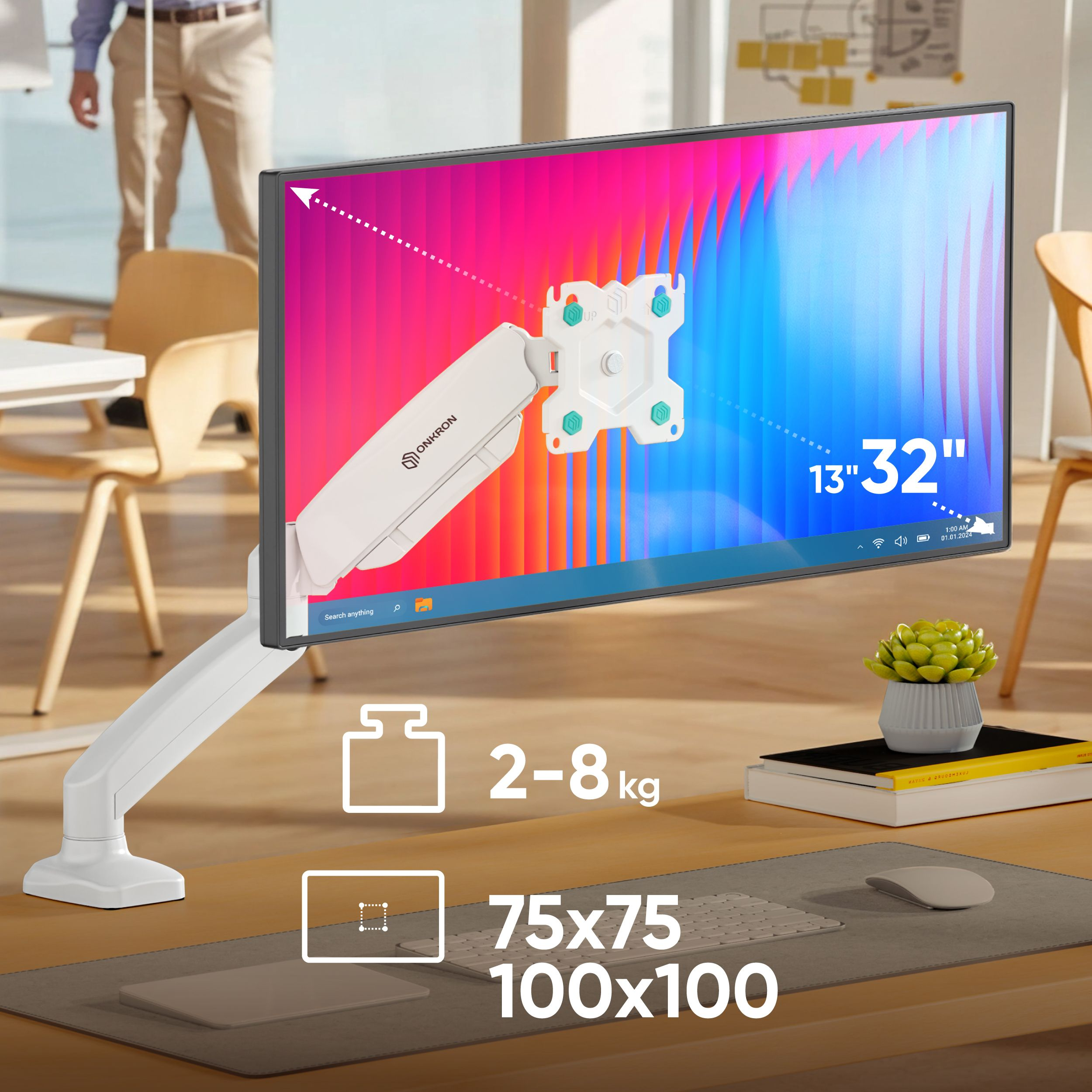 Monitor na białym stojaku. Ekran wyświetla kolorową grafikę. Specyfikacje wagi i rozmiaru na stole.