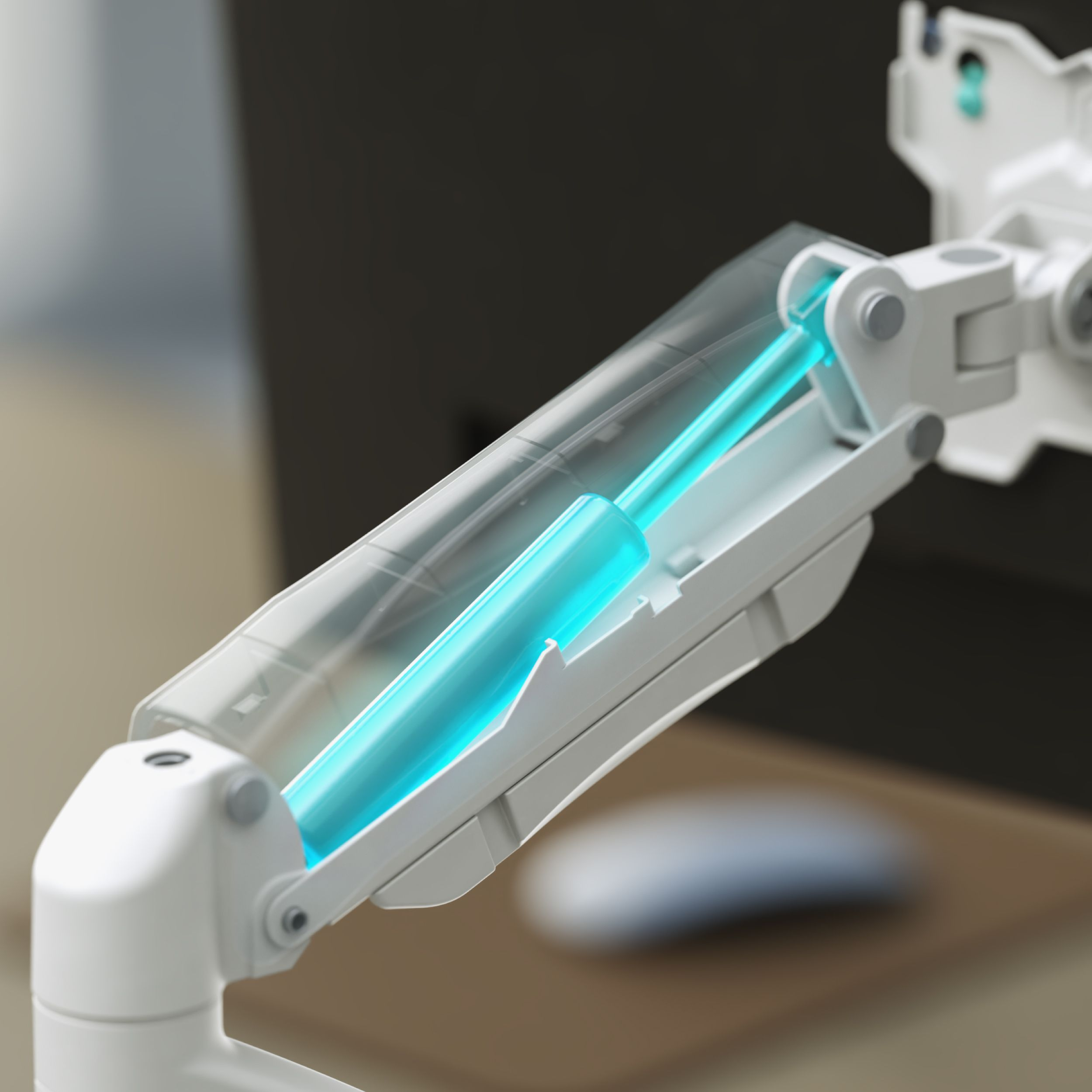 Zbliżenie białego ramienia monitora z niebieskim cylindrem wewnętrznym. Mysz komputerowa w tle.