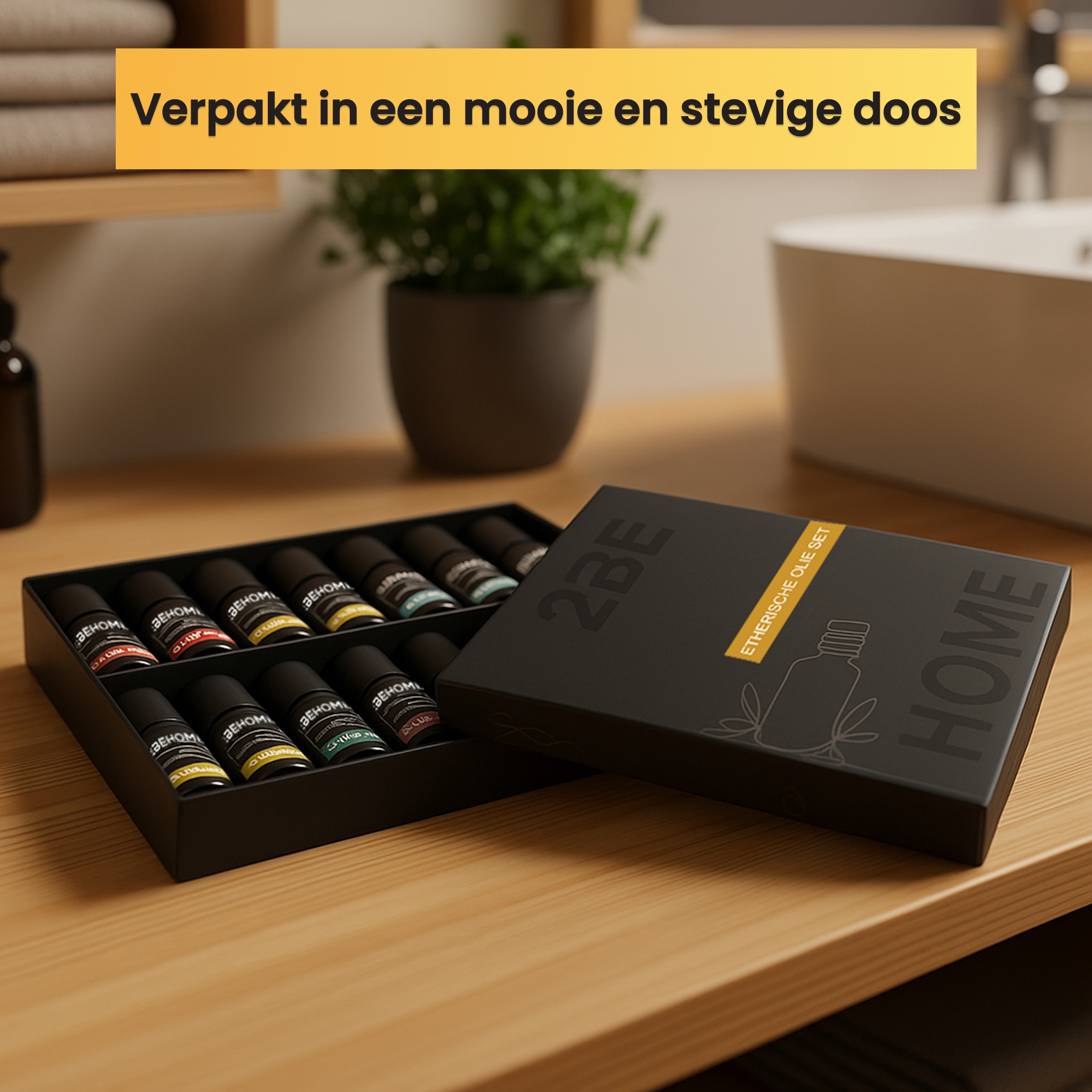 A black box with essential oil bottles is on a wooden surface. Text on top says 'Verpakt in een mooie en stevige doos'.