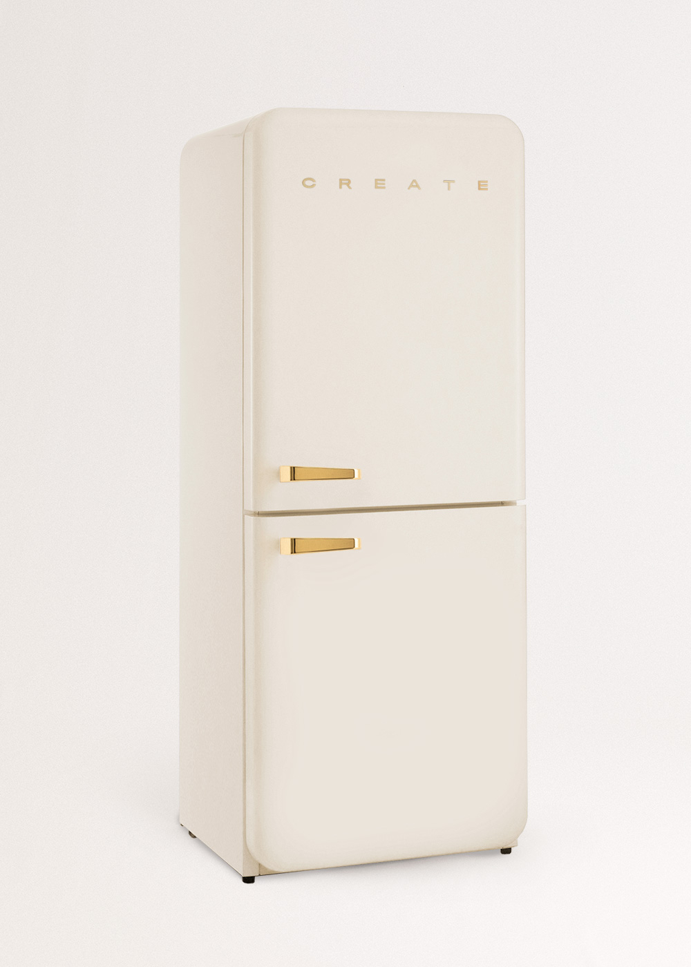 Refrigerador retro color crema con manijas doradas y 'CREATE' en la puerta. Dos secciones: nevera y congelador. Fondo blanco.