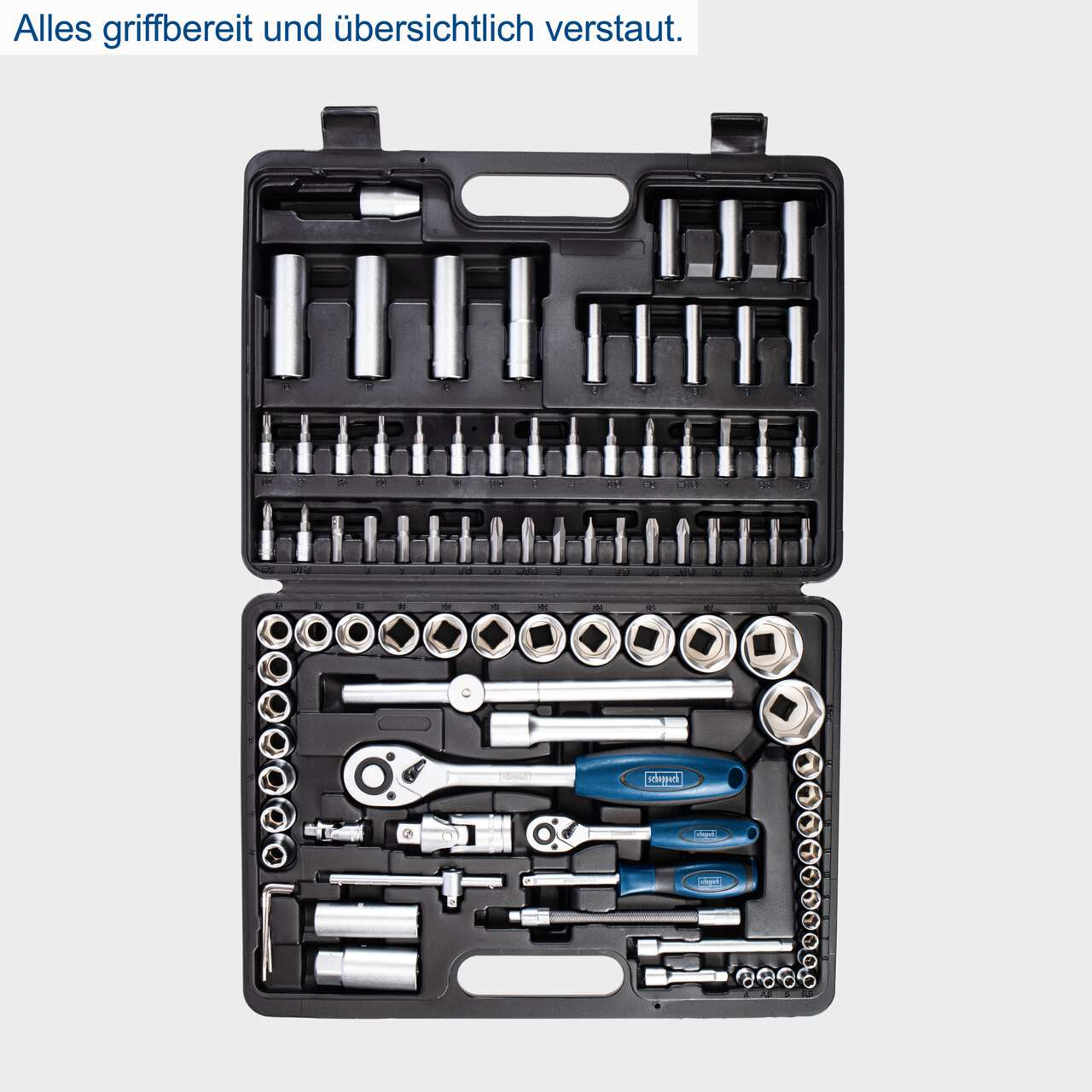 An open black toolbox filled with various silver and blue tools, including sockets, ratchets, and screwdriver bits, neatly organized.