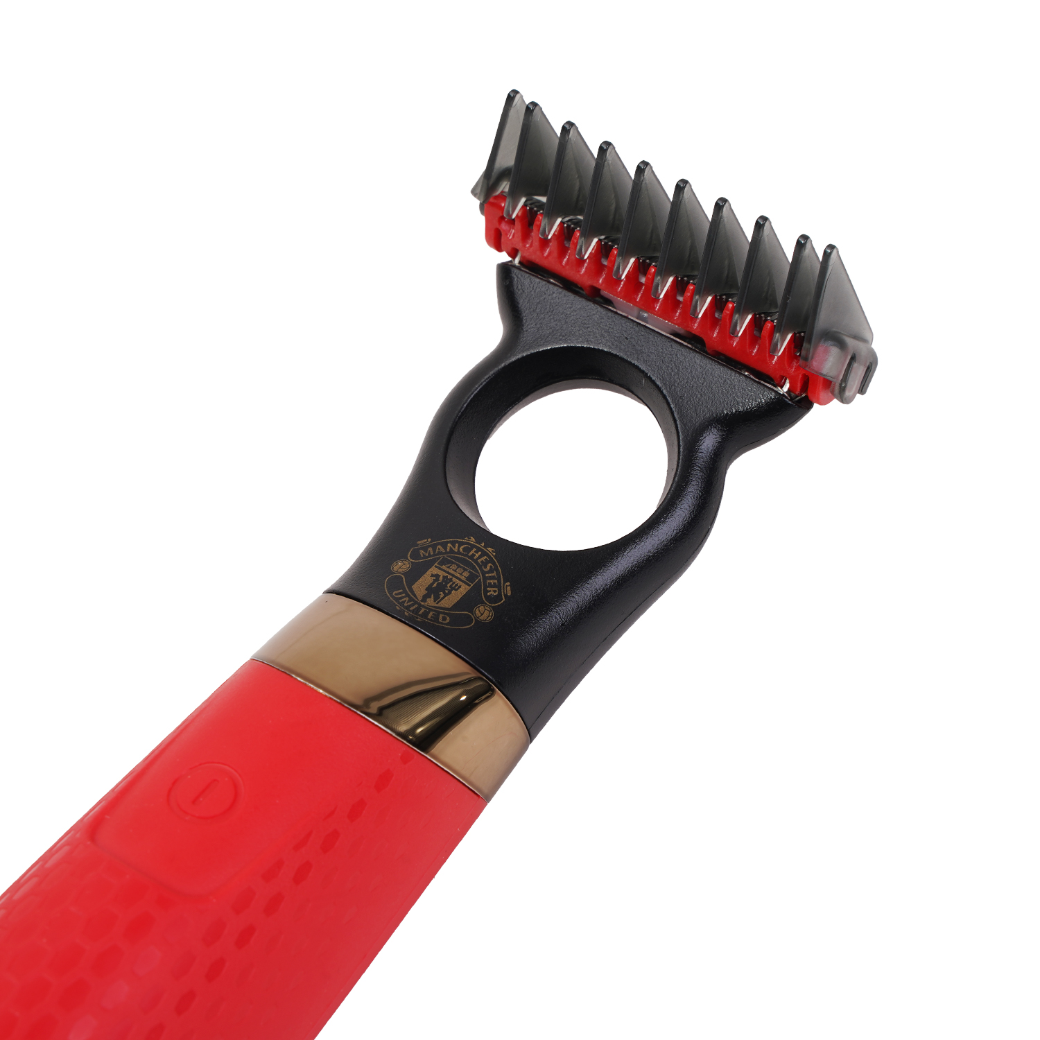 Primer plano de una cortadora de pelo roja y negra. La cortadora tiene una cabeza negra con cuchillas rojas y un mango rojo con el logo del Manchester United.