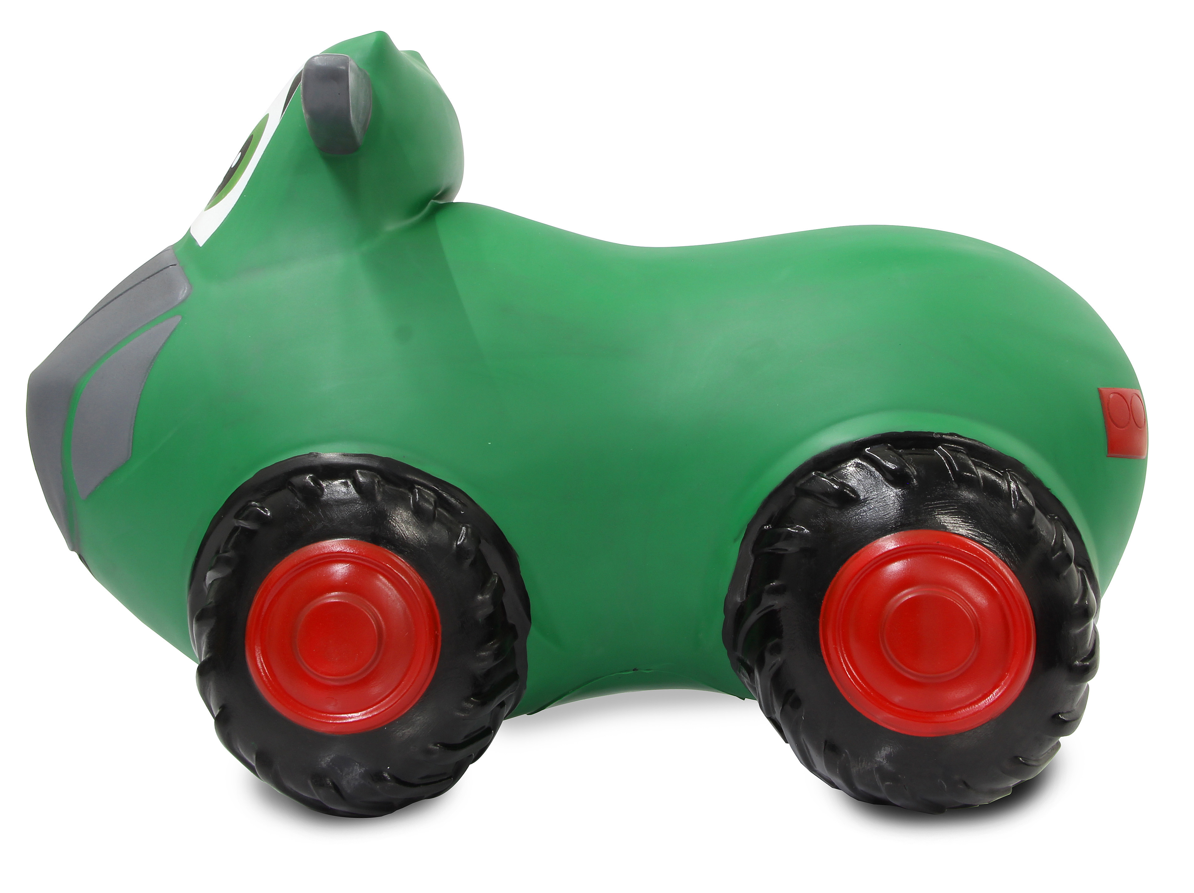 Zielony traktor zabawkowy z czarnymi oponami i czerwonymi środkami kół. Ma szary nos i białe oko.