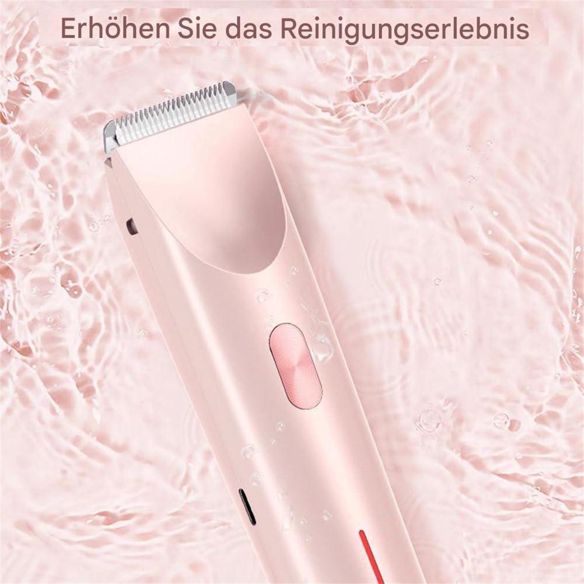 Ein rosa Elektrorasierer wird unter Wasser gezeigt. Der Rasierer hat eine silberne Klinge und einen rosa Körper. Wassertropfen sind sichtbar.