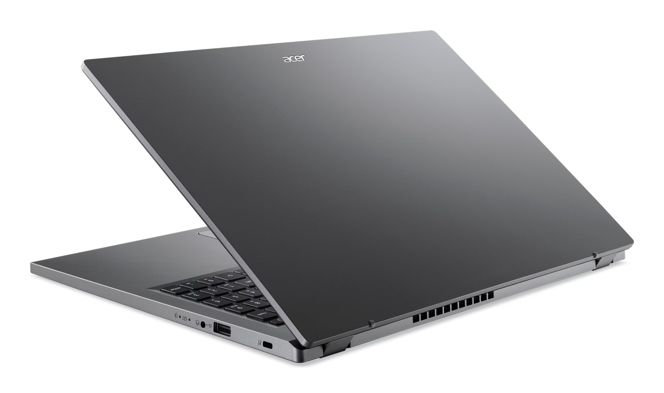 Un laptop Acer grigio è aperto, con lo schermo inclinato all'indietro. La tastiera è visibile. Lo sfondo è bianco.