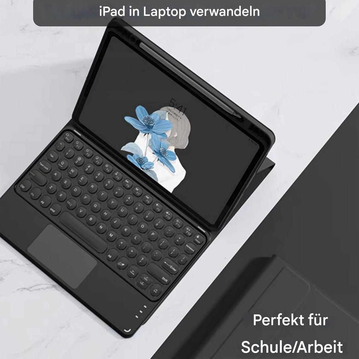 Schwarzes iPad in einer Tastaturhülle. Der Bildschirm zeigt eine Zeichnung einer Frau und blauen Blumen. Text: 'iPad in Laptop verwandeln'.