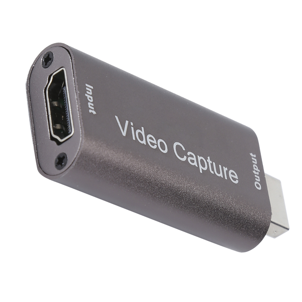 Ein graues Videoaufnahmegerät mit Ein- und Ausgangsanschlüssen. Es hat die Aufschrift 'Video Capture'. HDMI-Anschlüsse sind sichtbar.