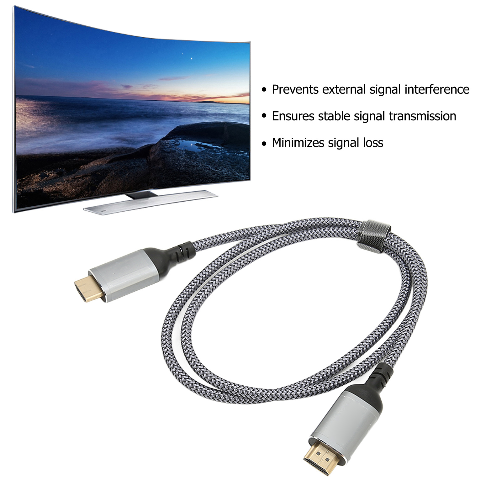 Ein geschwungener Fernsehbildschirm zeigt eine Küstenlandschaft. Ein HDMI-Kabel mit silbernen Steckern und grauem geflochtenem Kabel im Vordergrund.