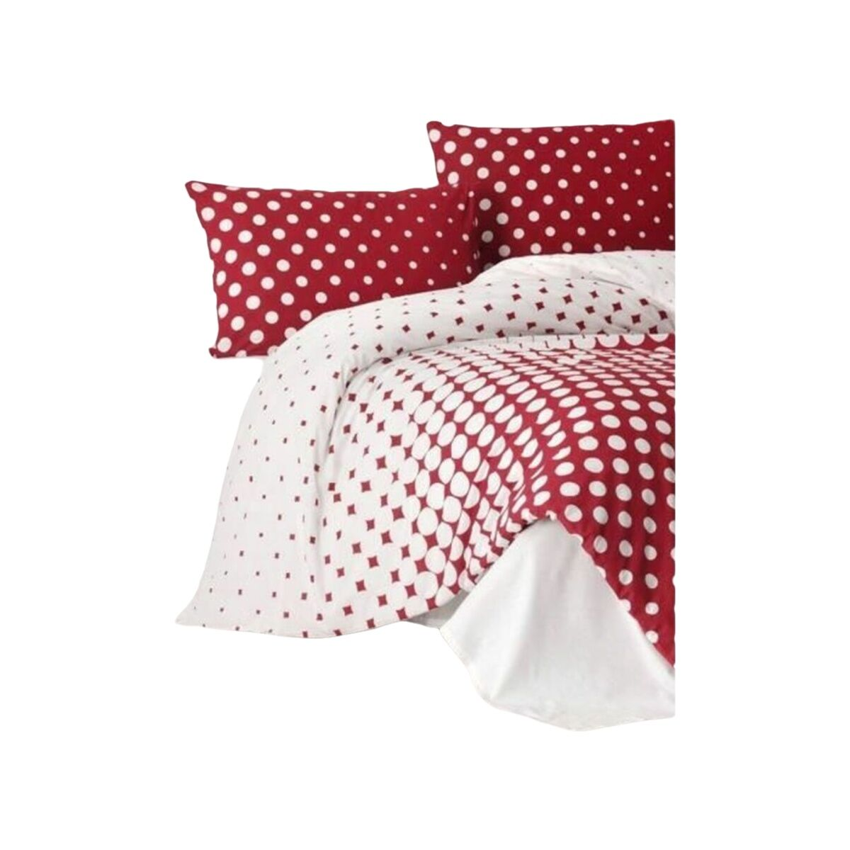 Rotes und weißes Polka-Dot-Bettwäsche-Set. Kissen und Bettdecke mit weißen Punkten auf rotem Hintergrund. Weiße Bettwäsche sichtbar.