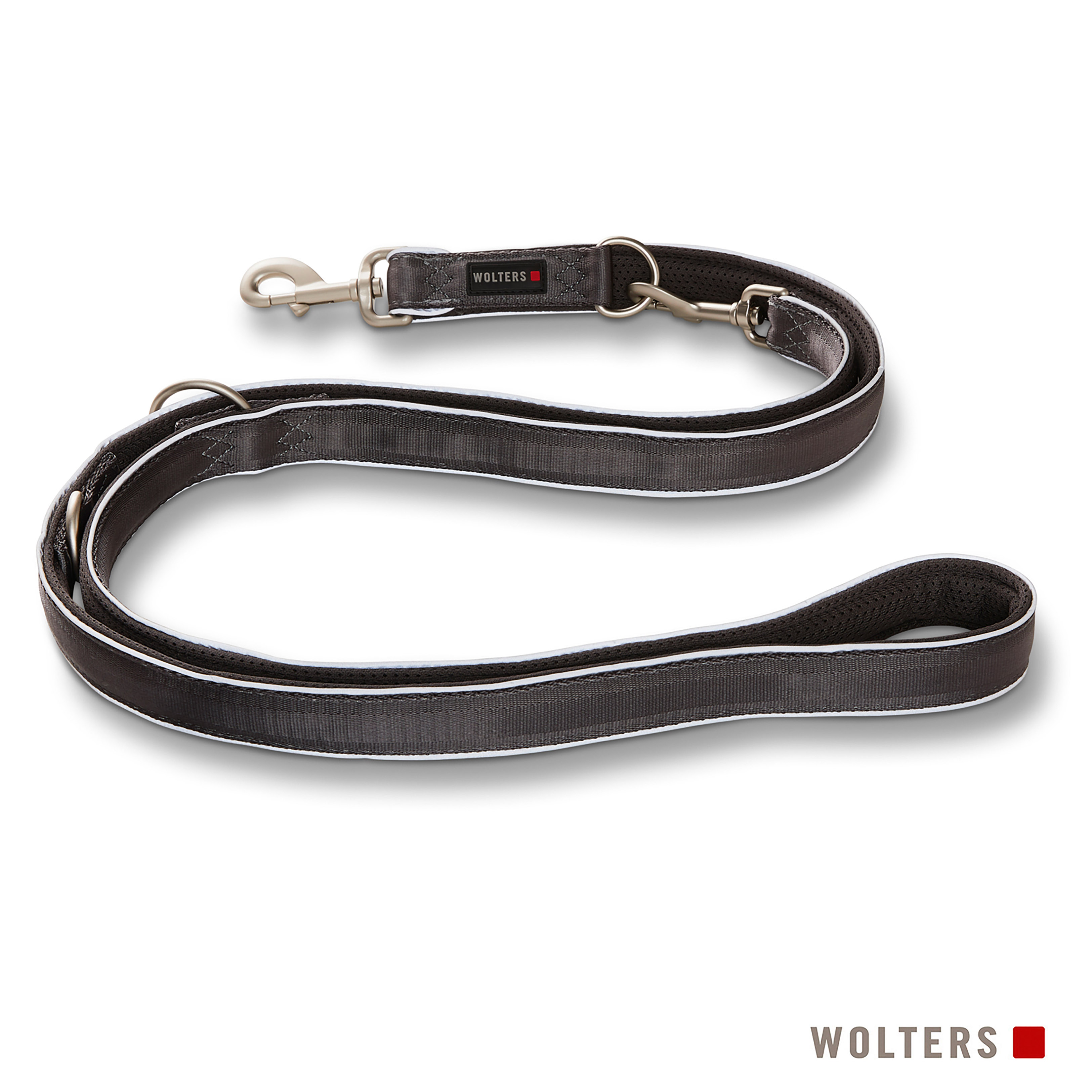 Eine dunkelgraue Hundeleine mit weißen Zierleisten und silbernen Metallverschlüssen. Die Marke WOLTERS ist sichtbar.
