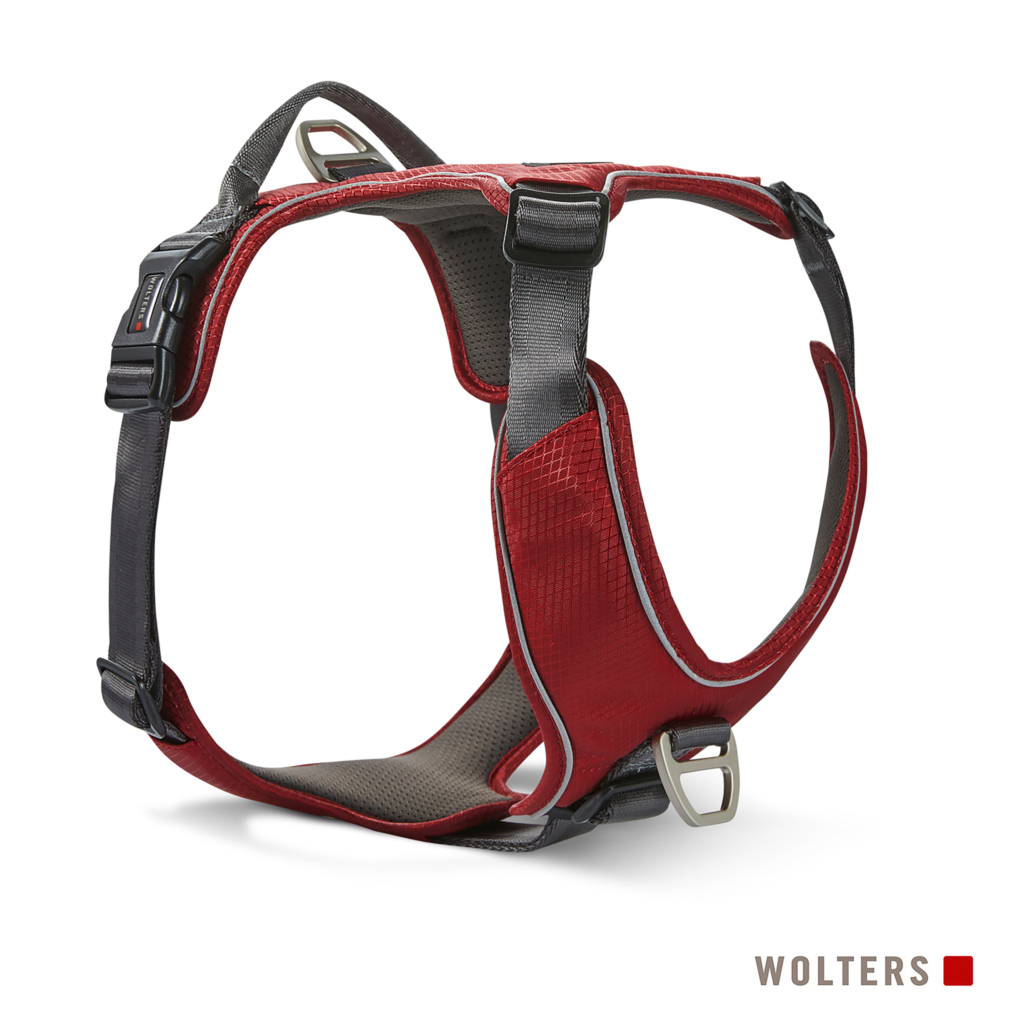 Rotes und graues Hunde-Geschirr. Es hat reflektierende Streifen und einen Markennamen an der Seite. Es ist auf weißem Hintergrund.