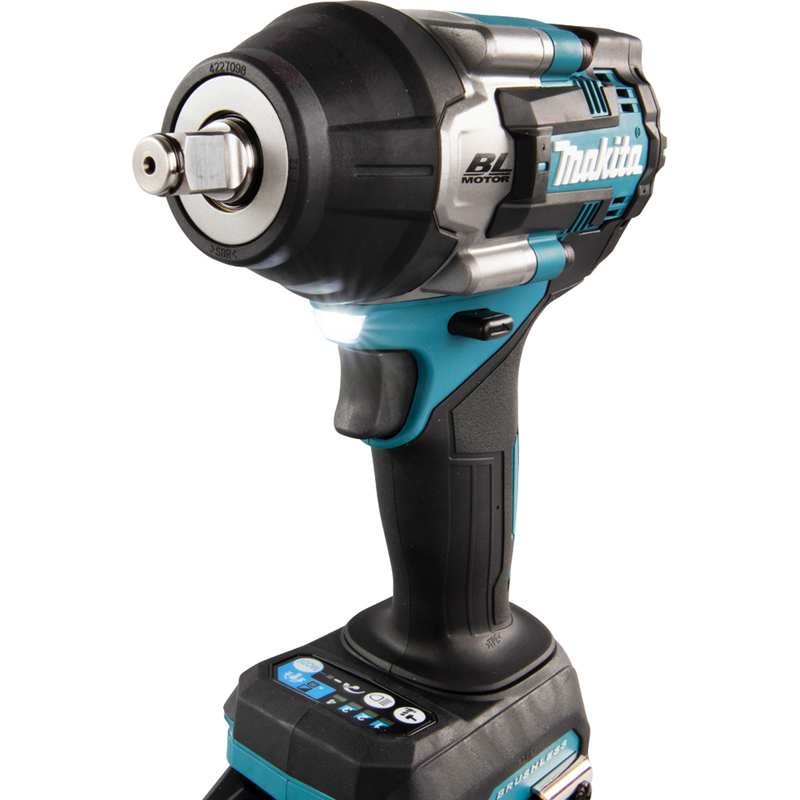 Una llave de impacto Makita teal y negra sobre fondo blanco. Tiene una cabeza plateada y una luz incorporada.