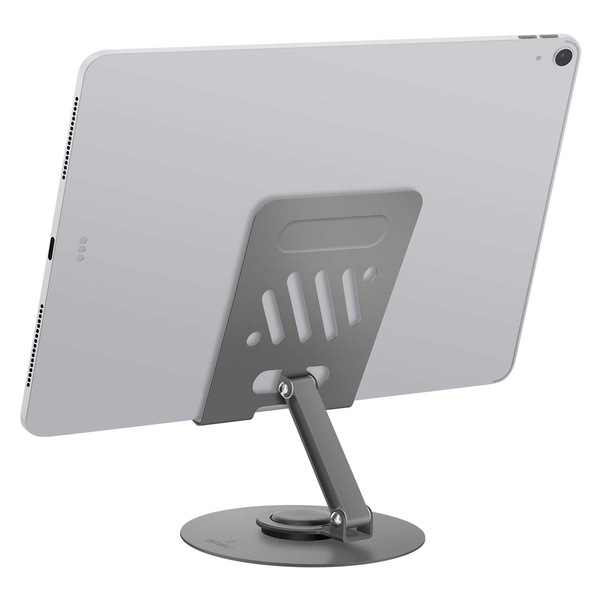 Ein silbernes Tablet liegt auf einem grauen Ständer. Der Ständer hat einen kreisförmigen Fuß, einen Stützarm und eine Rückwand mit Lüftungsschlitzen.