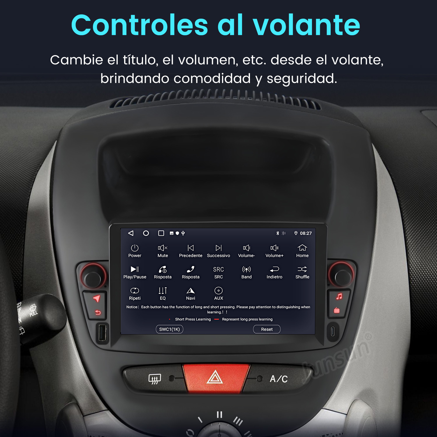 Panel del coche con pantalla táctil. Botones de encendido, volumen y navegación. Texto en español. Volante y salpicadero visibles.