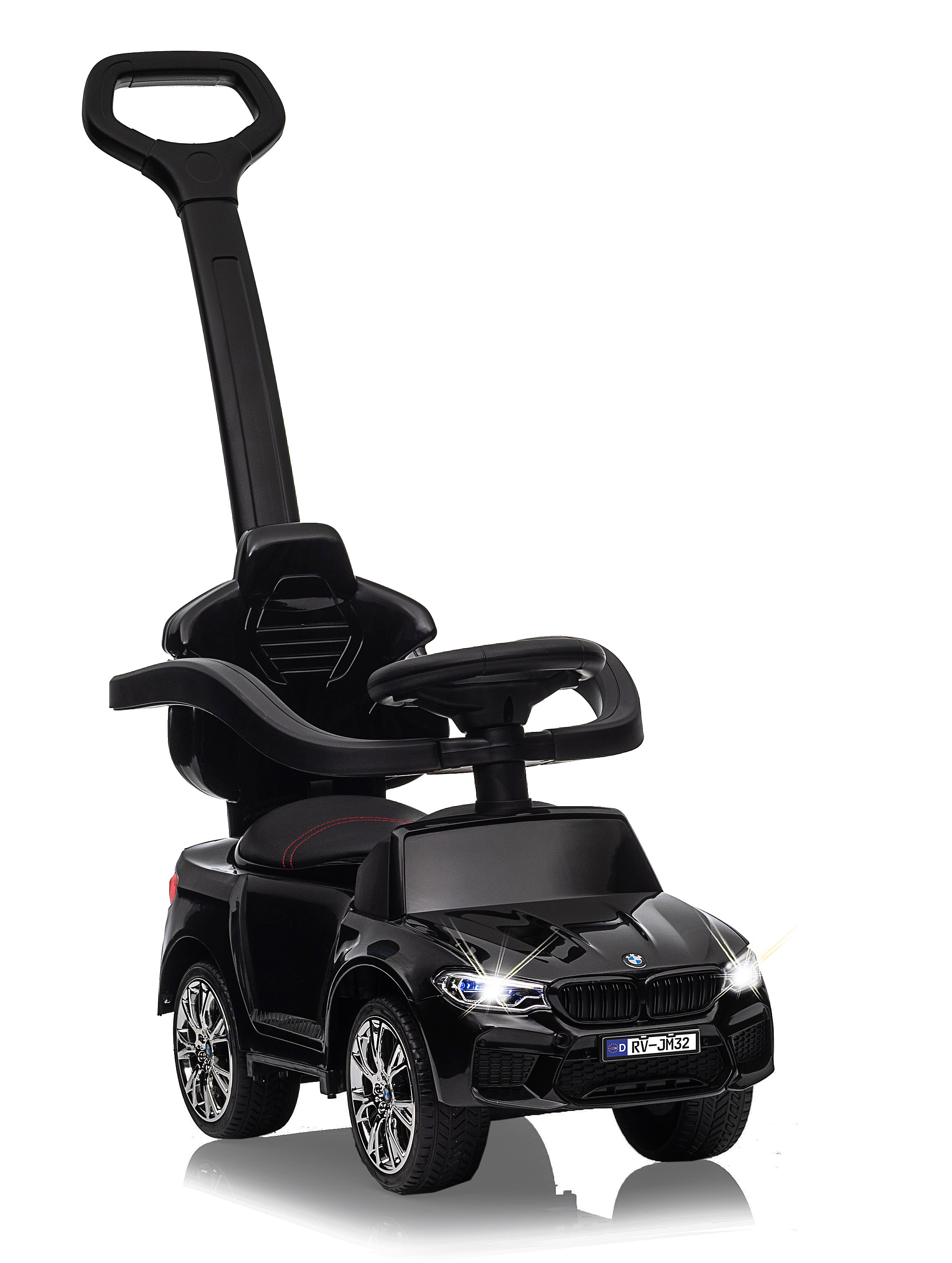 Un'auto giocattolo nera con maniglia per genitori. Ha ruote lucide e luci. L'auto è su sfondo bianco.