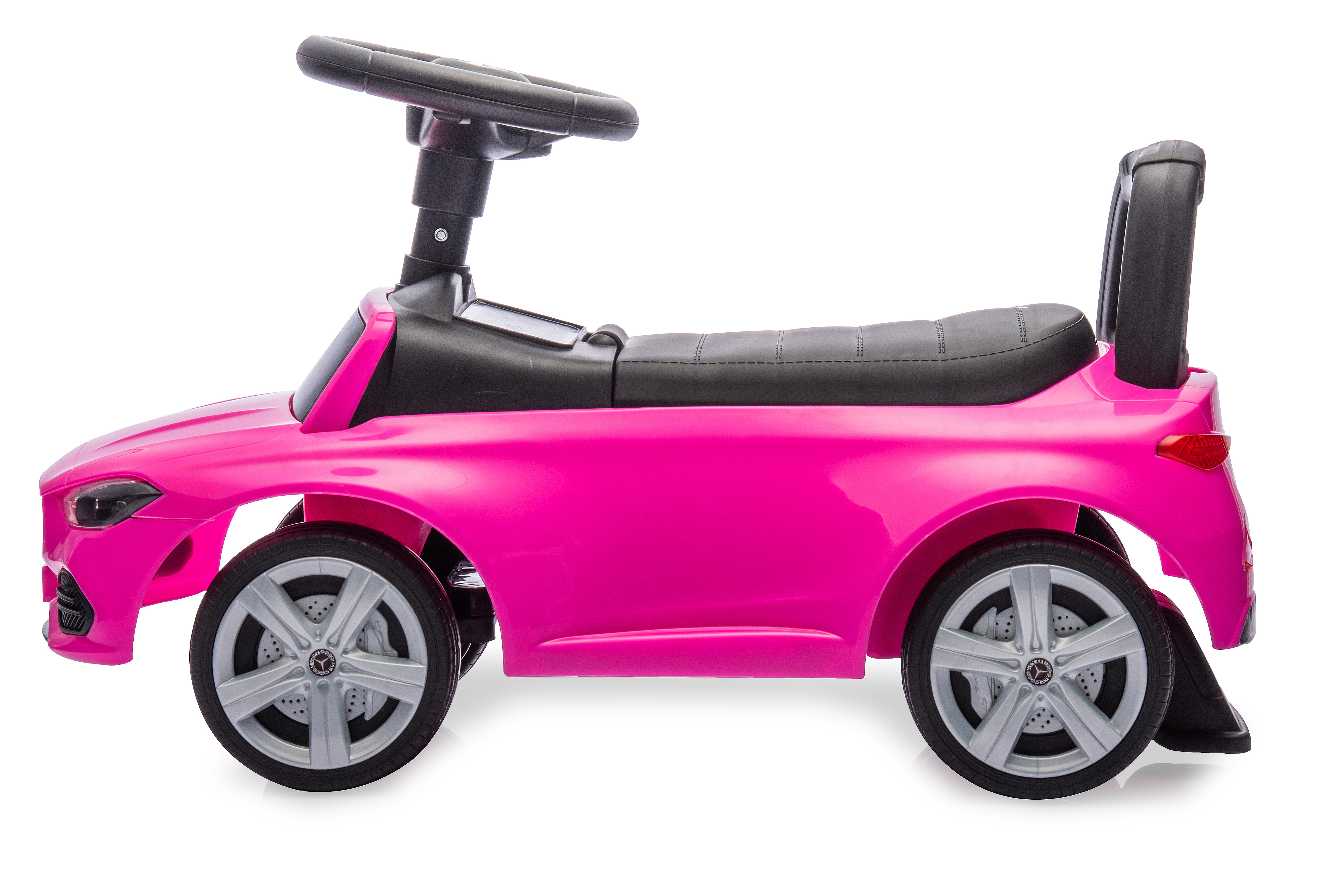 Rosa Spielzeugauto mit schwarzem Lenkrad, Sitz und Griff auf weißem Hintergrund.