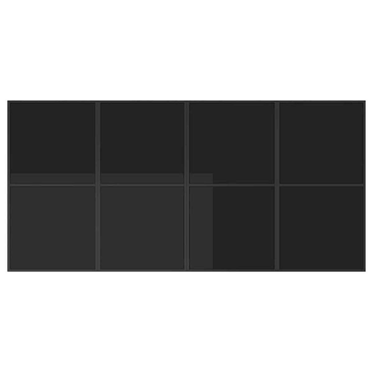 Una estructura oscura y rectangular. Está dividida en ocho secciones rectangulares iguales por líneas verticales y horizontales.