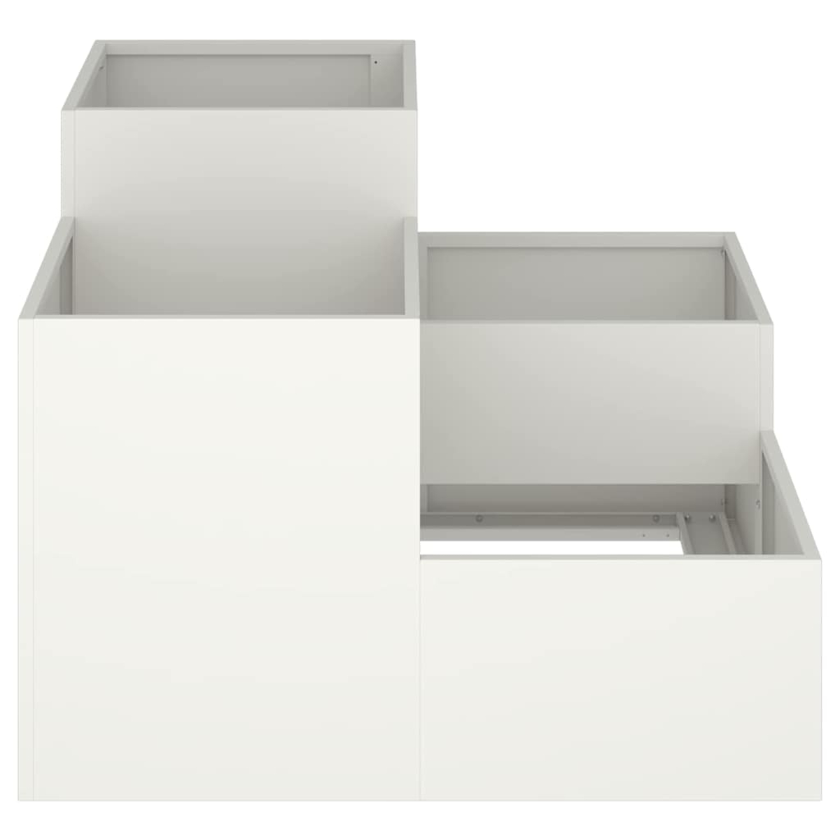 Un'unità di stoccaggio bianca a gradini. Ha tre scomparti aperti di dimensioni variabili, creando un design a gradini. Lo sfondo è semplice.