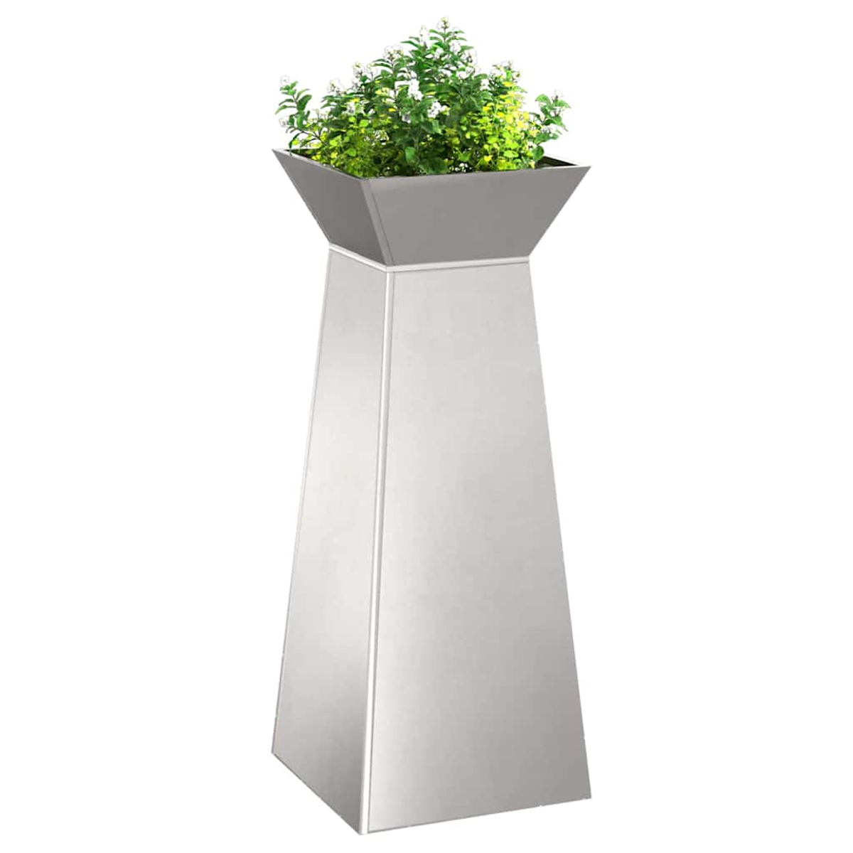 Una fioriera moderna argentata con base trapezoidale contiene piante verdi con piccoli fiori bianchi. La fioriera è su sfondo bianco.