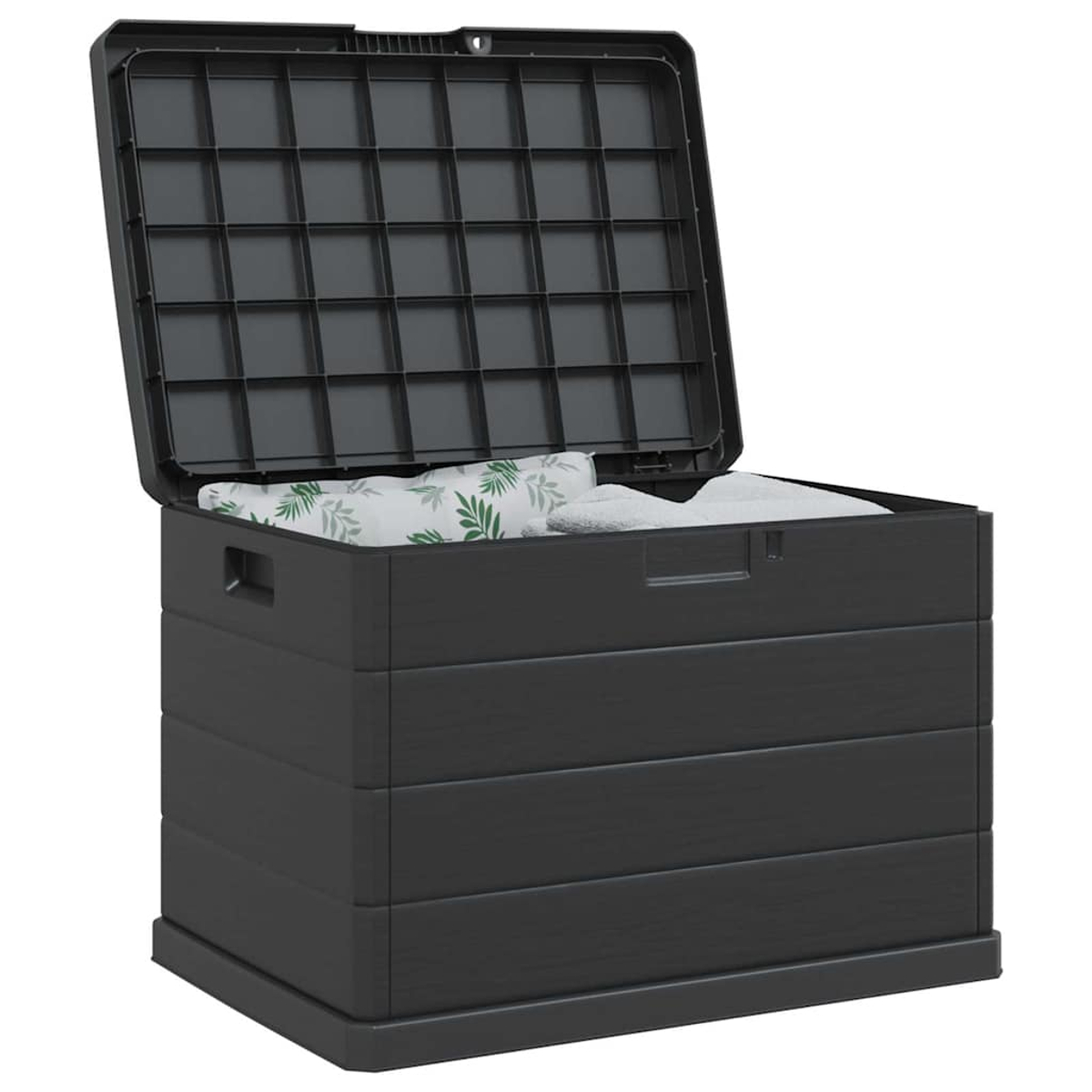 Eine schwarze Aufbewahrungsbox mit offenem Deckel. Im Inneren befinden sich gefaltete Handtücher und ein Kissen mit Blättermuster. Die Box steht auf weißem Hintergrund.