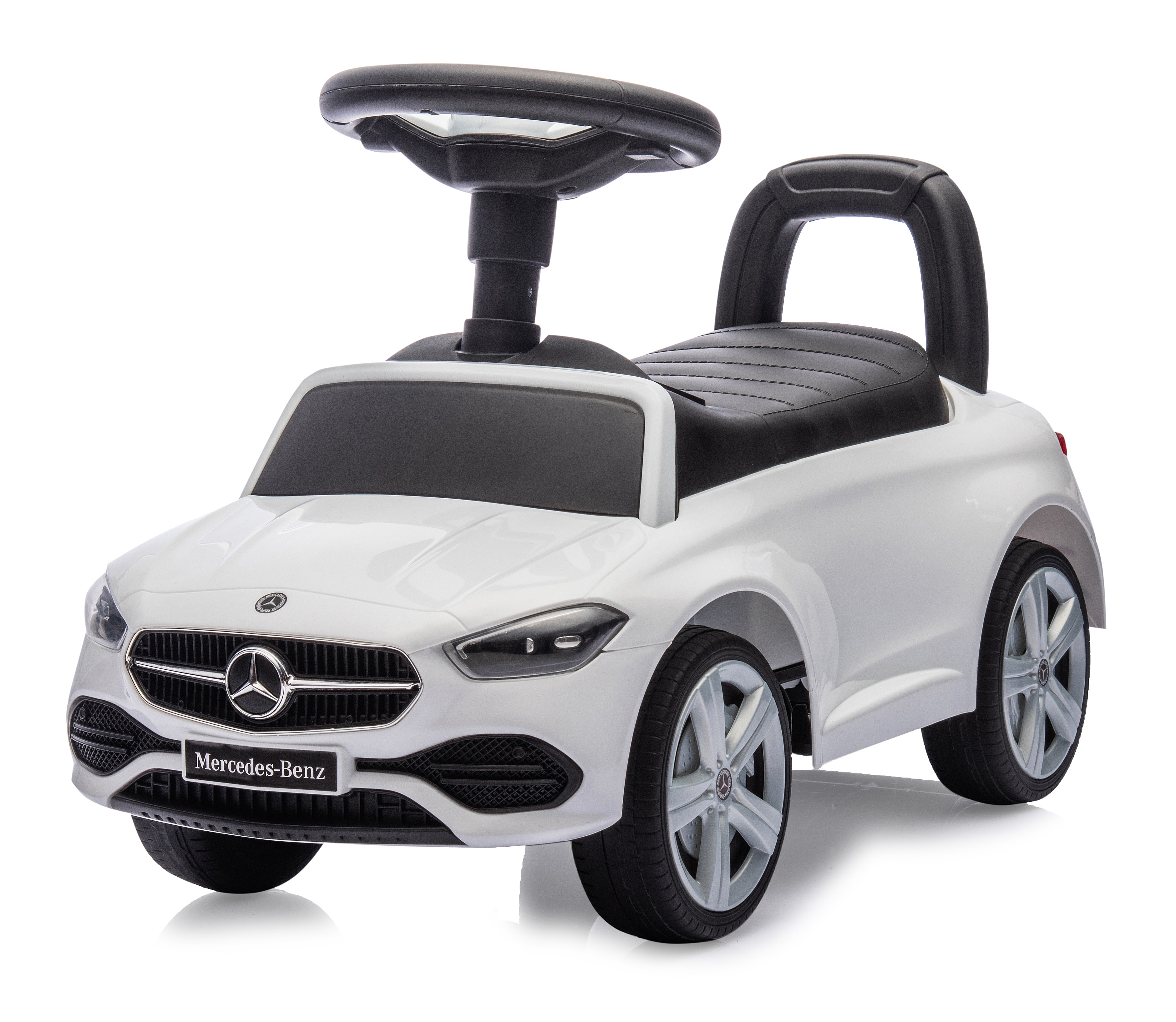 Ein weißes Mercedes-Benz Spielzeugauto zum Aufsitzen. Es hat ein schwarzes Lenkrad, Sitz und Griff. Die Räder sind grau.