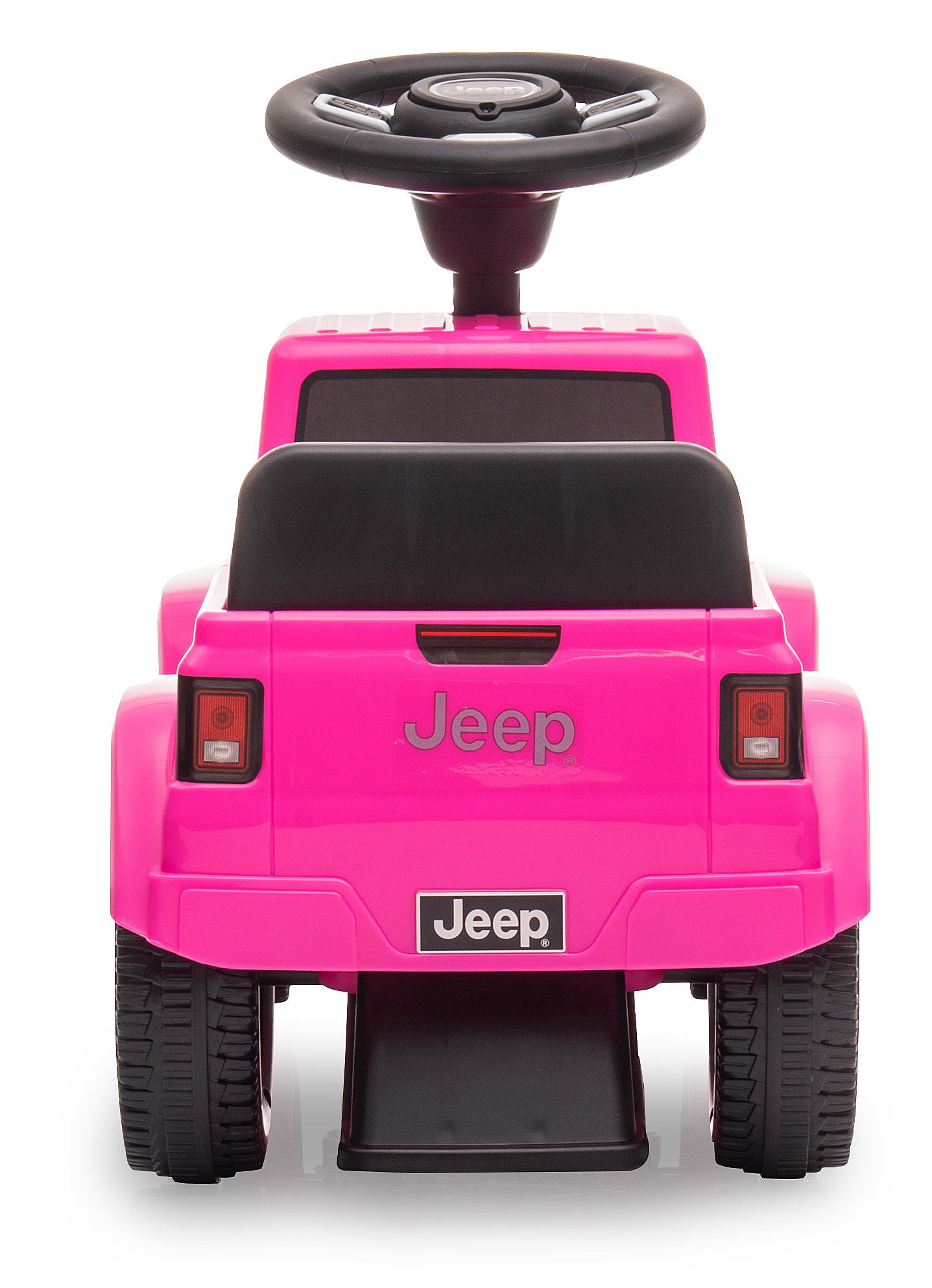 Ein rosa Jeep-Spielzeug zum Aufsitzen, von hinten gesehen. Es hat ein schwarzes Lenkrad, einen schwarzen Sitz und das Jeep-Logo.