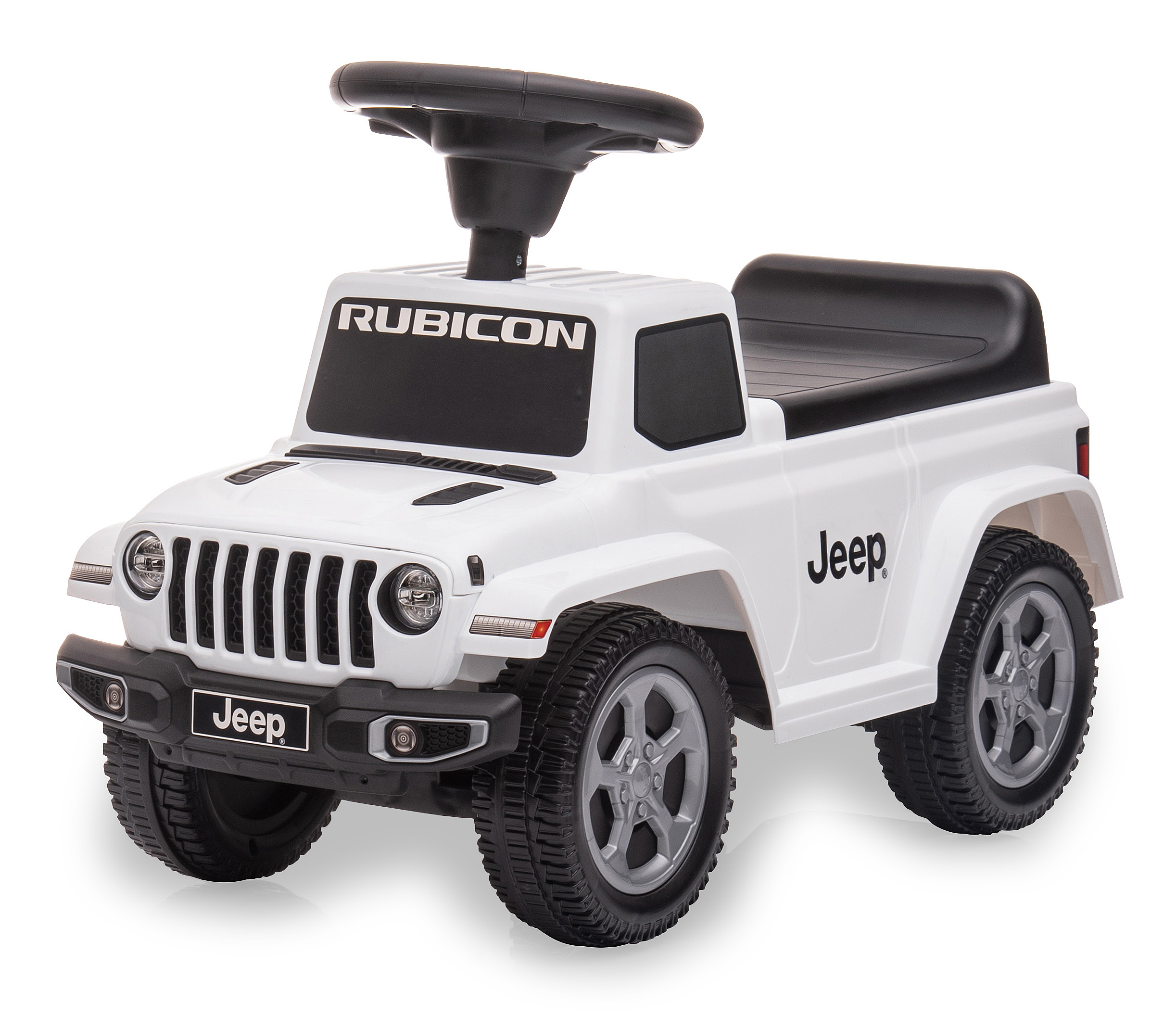 Ein weißes Jeep Rubicon Spielzeugauto zum Aufsitzen. Es hat ein schwarzes Lenkrad, schwarze Sitze und graue Räder. Das Jeep-Logo ist sichtbar.